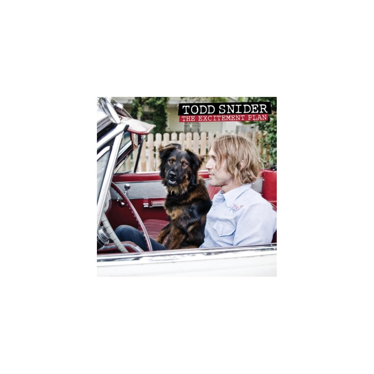 Un homme et un chien sont assis dans une voiture rouge, la voiture est décapotable. Le titre de l'album est en haut.