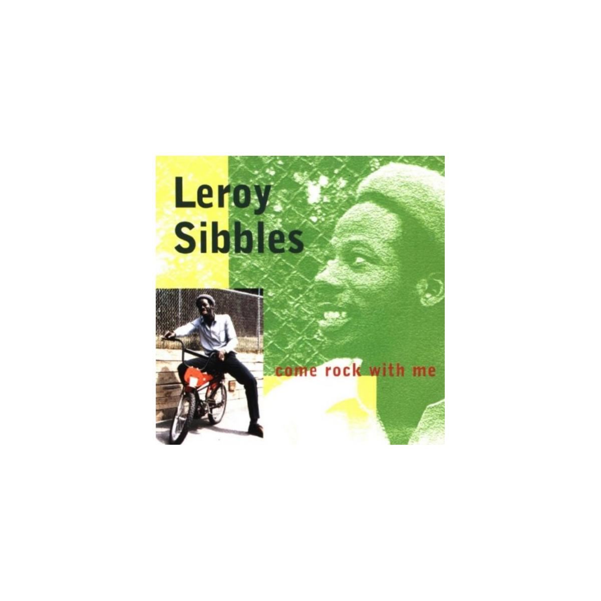 CD-cover: Leroy Sibbles. Man op een fiets. Groene achtergrond met gele tekst.
