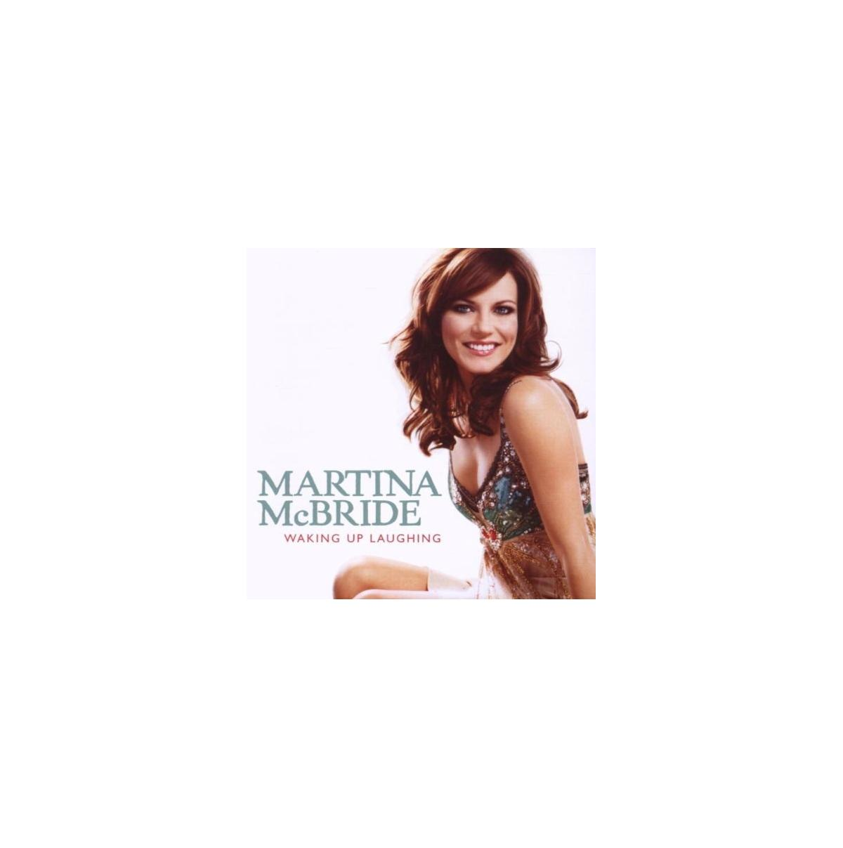 Pochette de l'album de Martina McBride. Elle sourit, vêtue d'une robe colorée. Texte : 'Waking Up Laughing'.