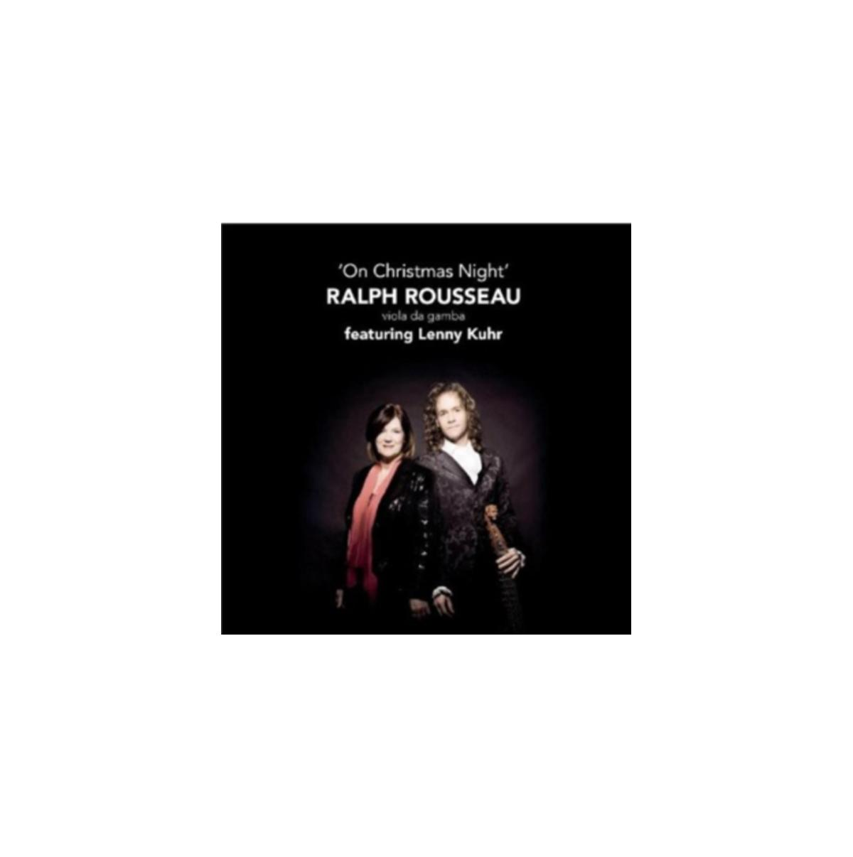 Couverture de l'album avec deux personnes. Le titre est "On Christmas Night".