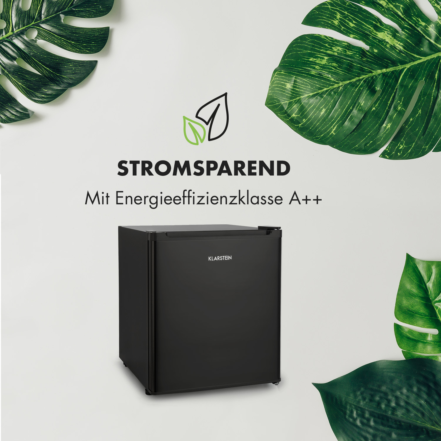Mini nevera negra con el texto Stromsparend y eficiencia energética A++.