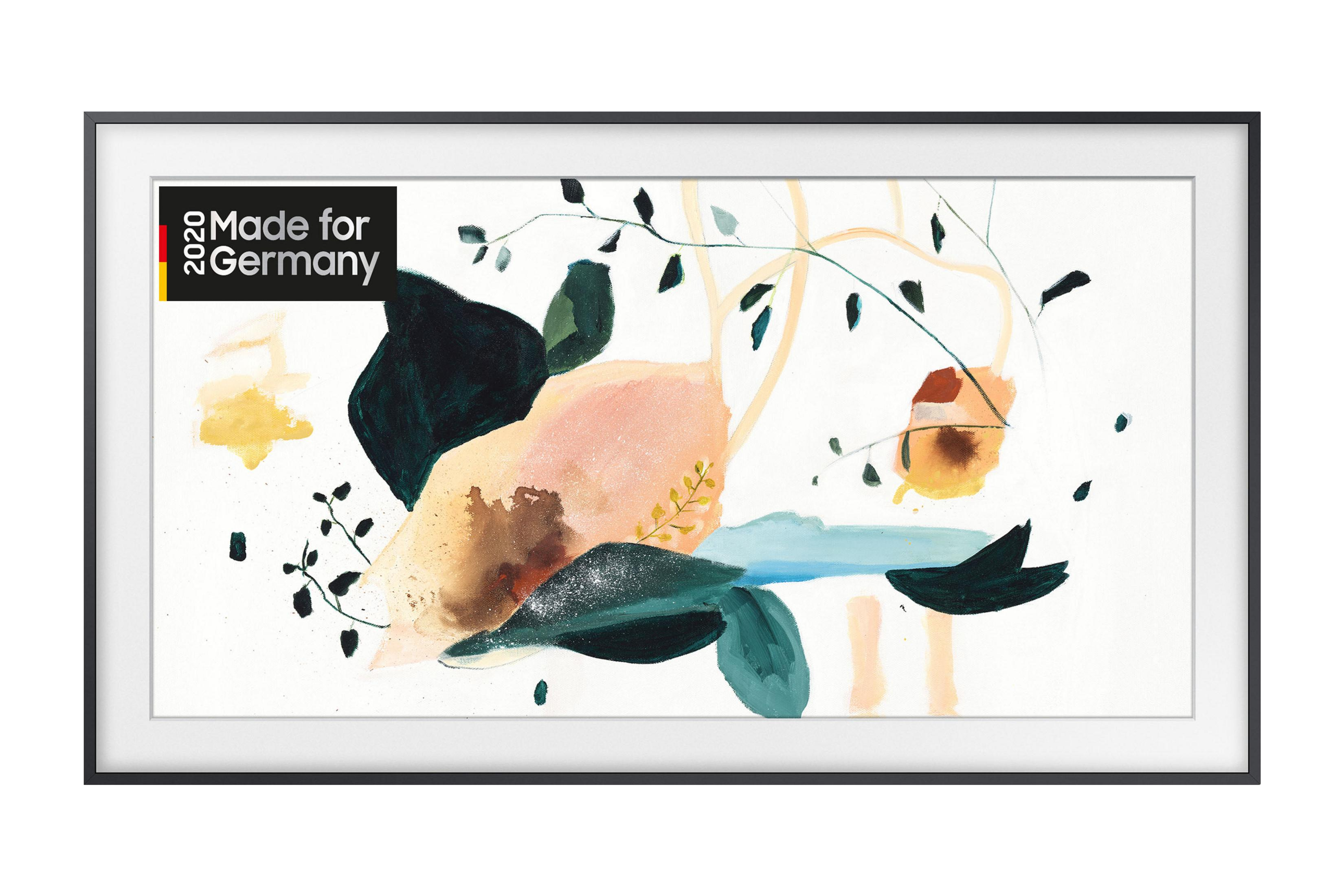 Samsung Frame TV, zeigt abstrakte Kunst in weißem Rahmen. Made for Germany-Etikett.