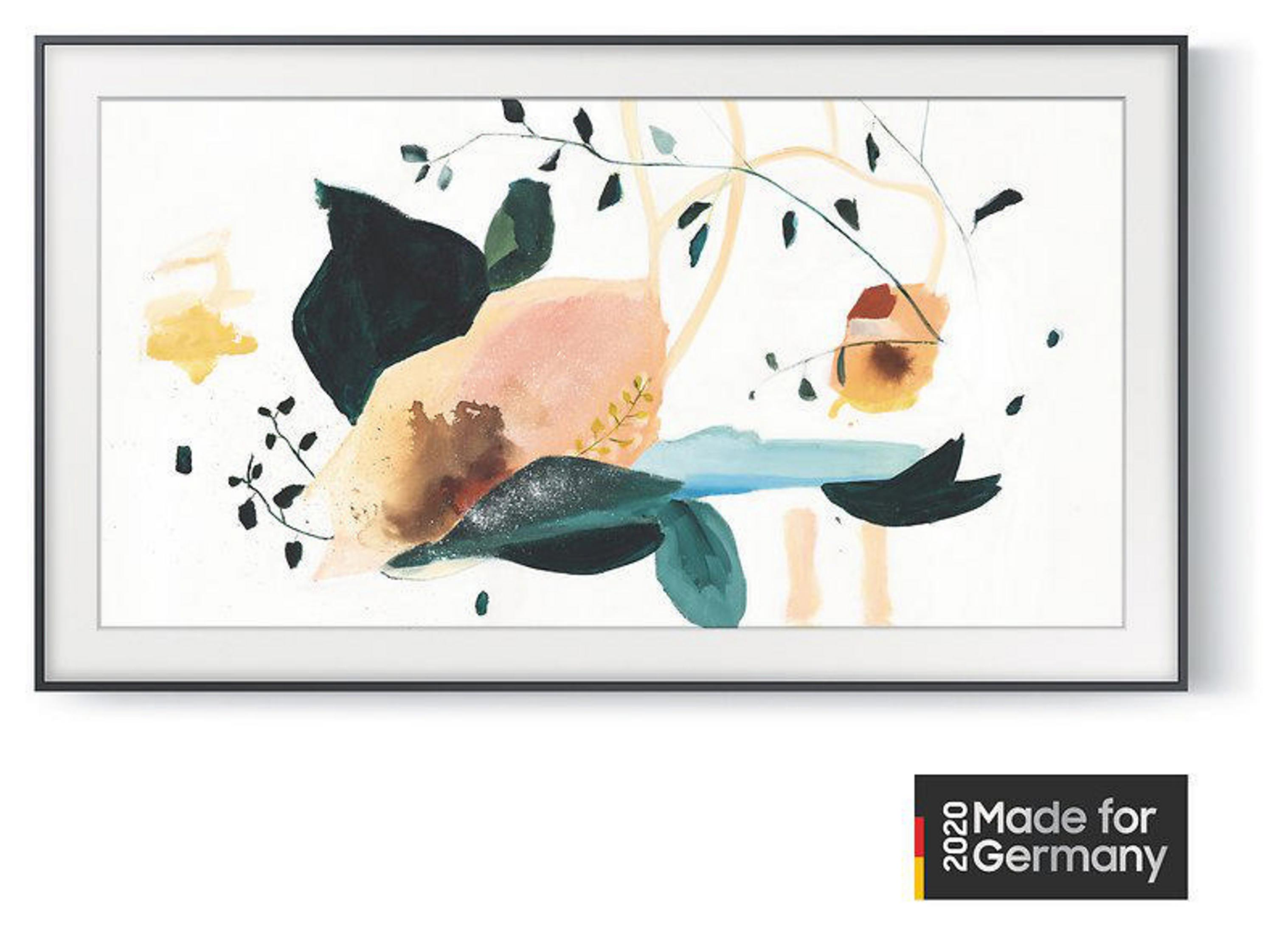 Sztuka abstrakcyjna na czarno obramowanym telewizorze. Grafika ma różowe, zielone i żółte pociągnięcia pędzla na białym tle.