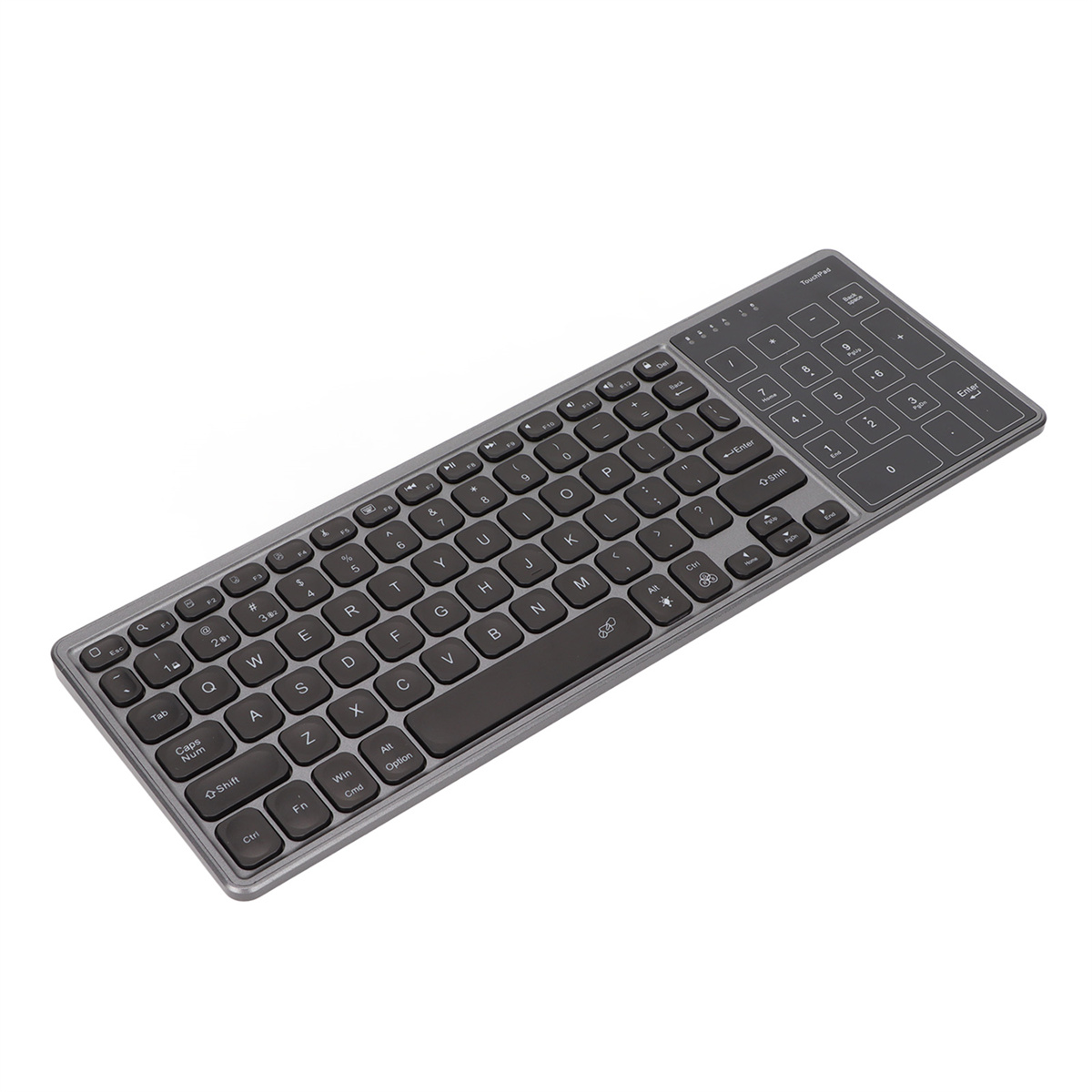 Silberne, rechteckige Tastatur mit Tasten. Nummernblock rechts. Klein und kompakt.