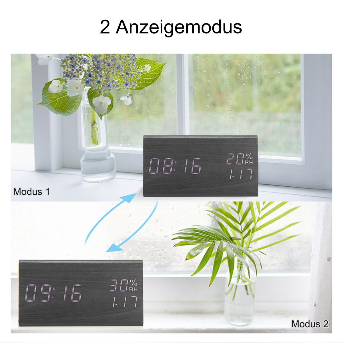 Digitalanzeigeuhr in zwei Modi: Uhrzeit, Datum, Luftfeuchtigkeit am Fenster.