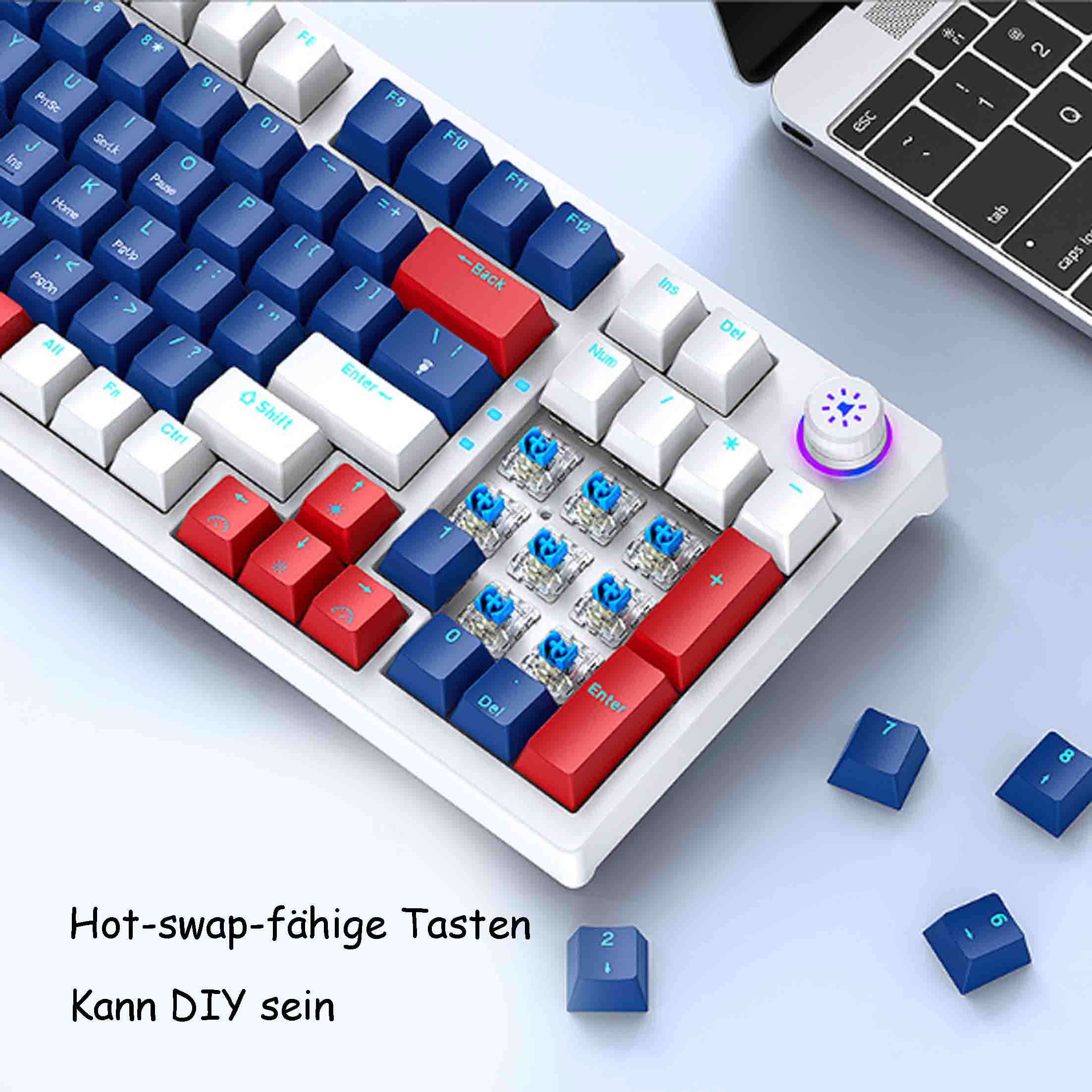 Biała klawiatura mechaniczna z niebieskimi i czerwonymi klawiszami. Niektóre klawisze są usunięte.