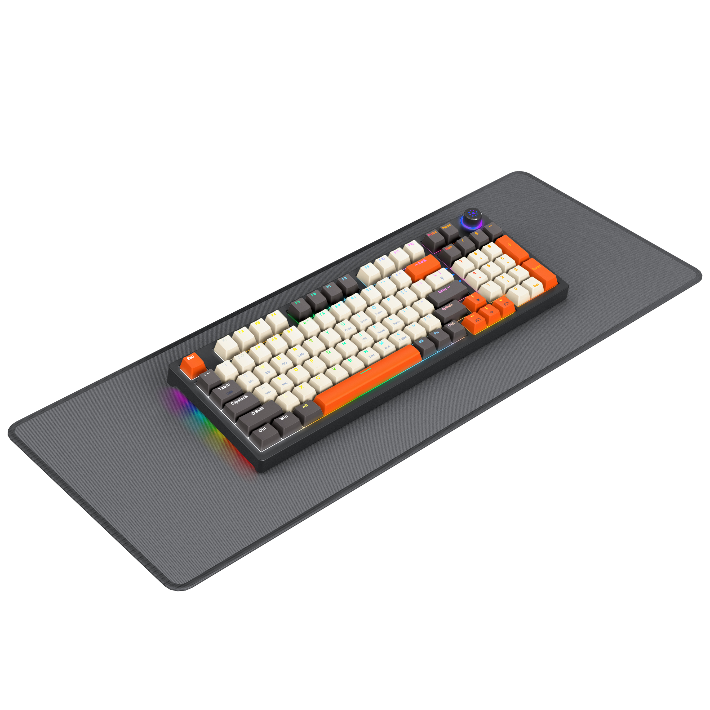 Klawiatura z białymi, pomarańczowymi i czarnymi klawiszami na szarej macie. Pokrętło jest w prawym górnym rogu.