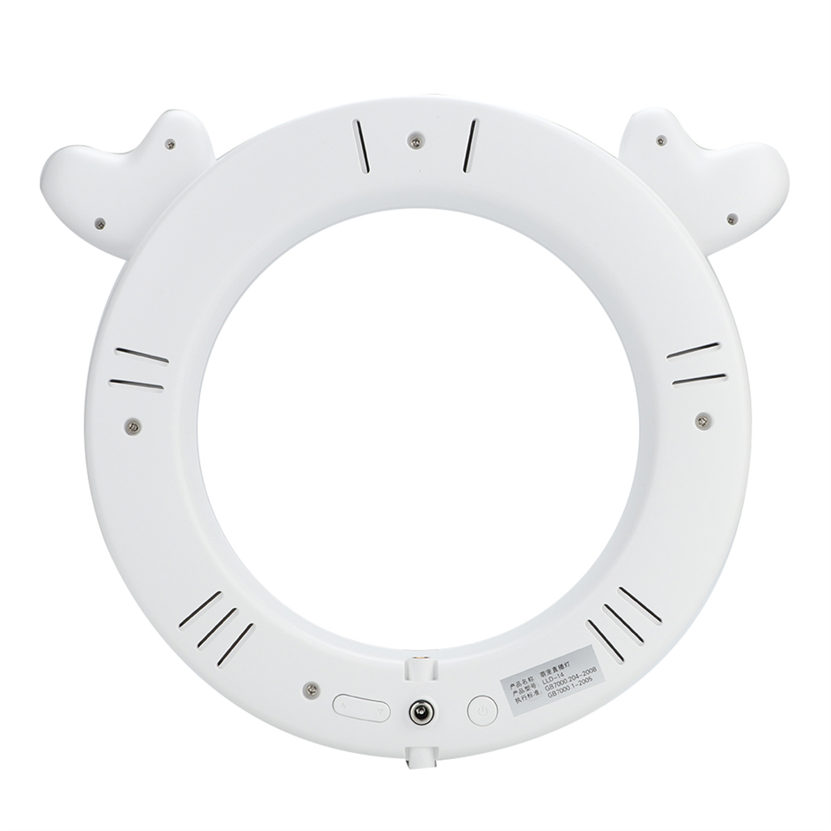 Ein weißes Ringlicht mit katzenohrähnlichen Formen. Es hat mehrere kleine Schrauben und Linien.