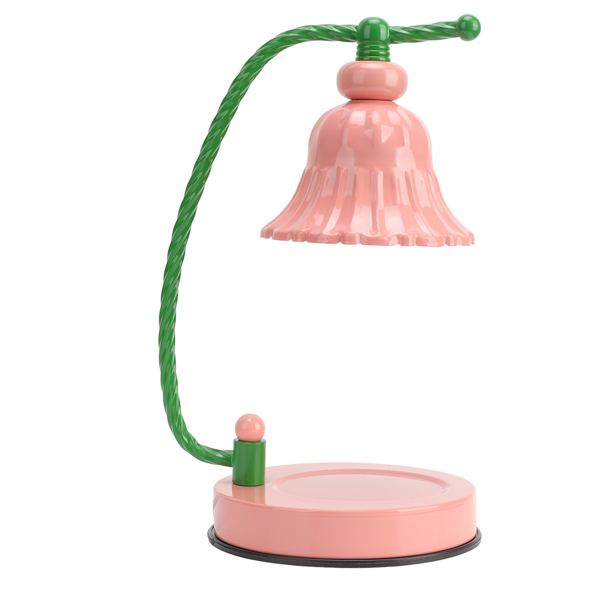 Eine rosa glockenförmige Lampe mit grünem Stiel und Sockel wird auf weißem Hintergrund gezeigt.