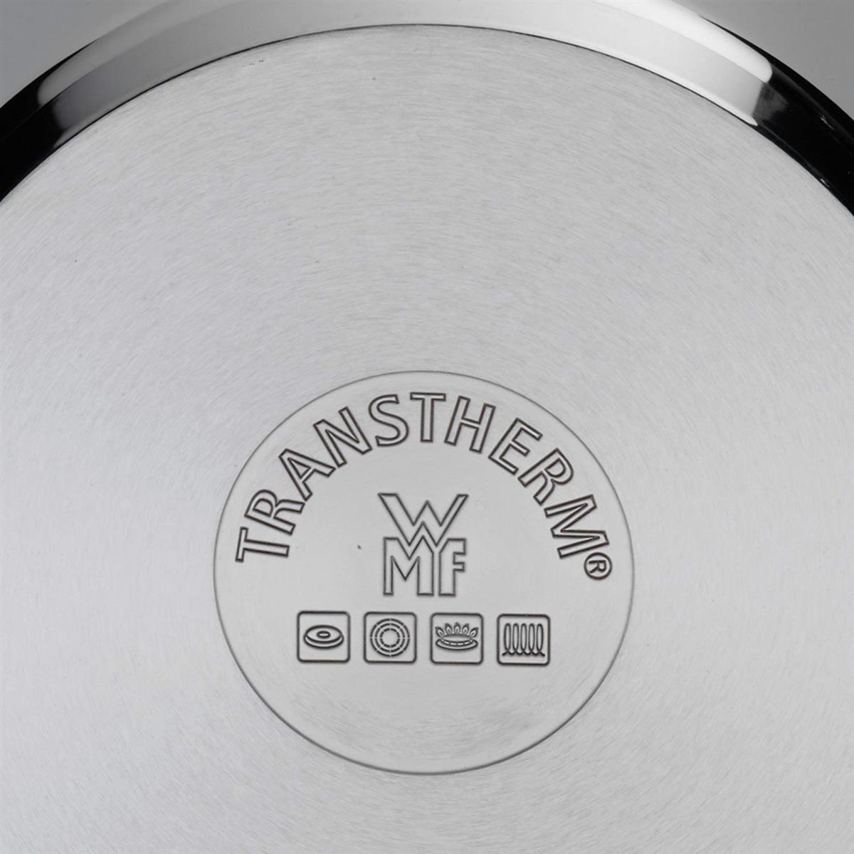 TransTherm ve WMF logosu ve simgeleri olan bir metal tencerenin altı.