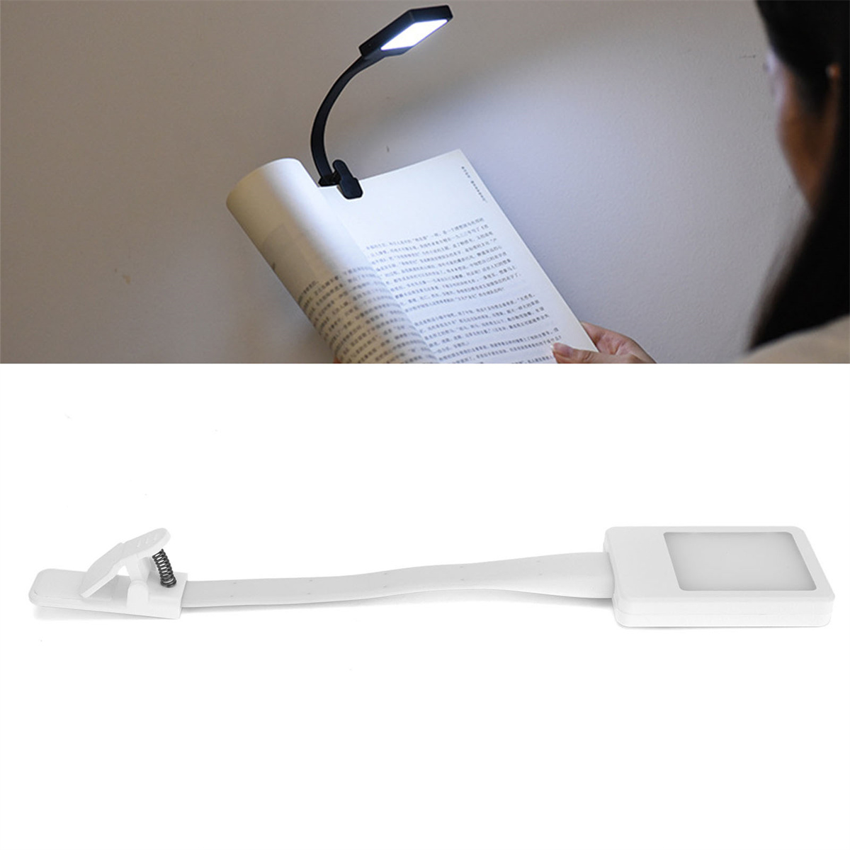 Eine schwarze Leselampe auf einem Buch und eine weiße Clip-On-Lampe.