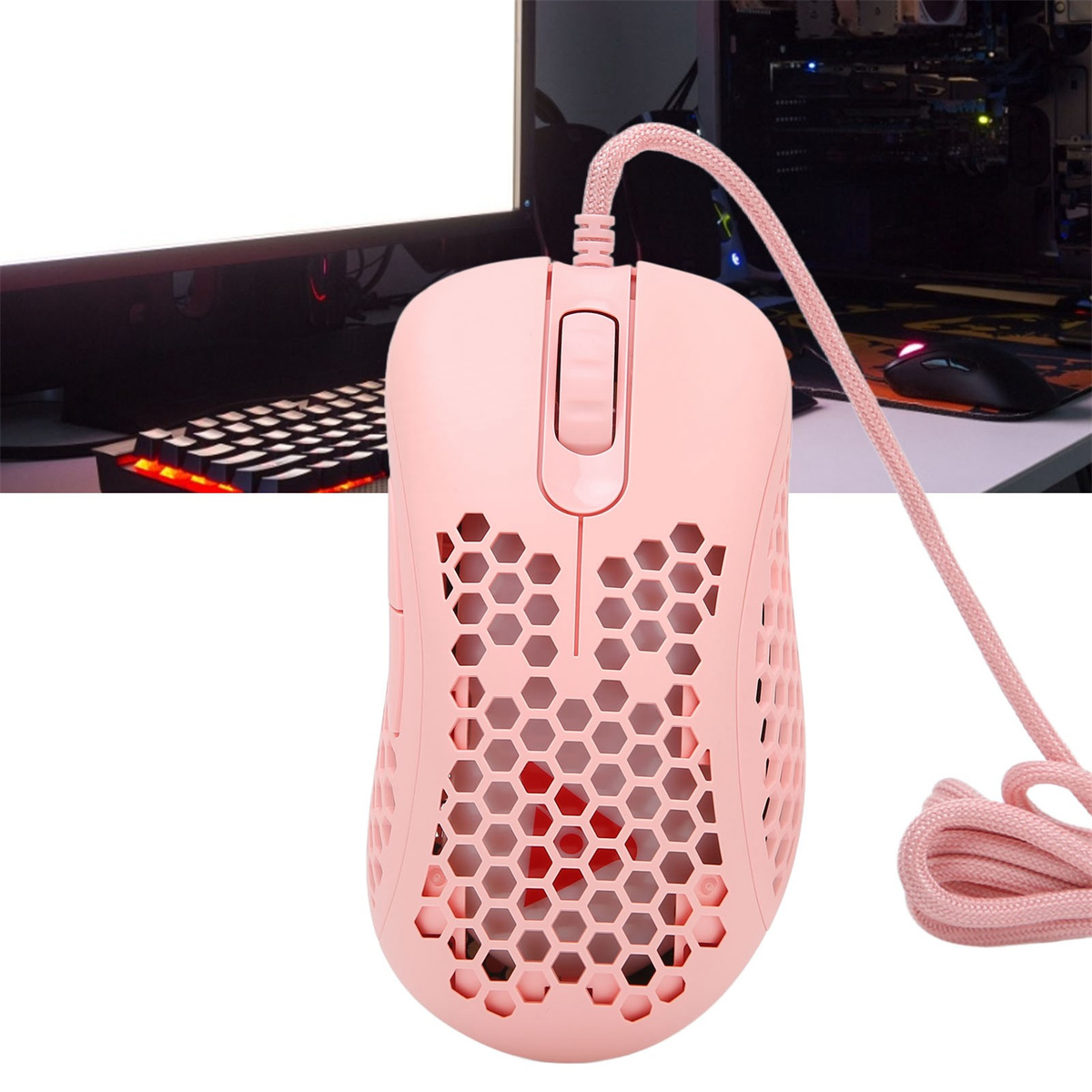 Rosa Gaming-Maus mit Wabenmuster und pinkem Kabel.