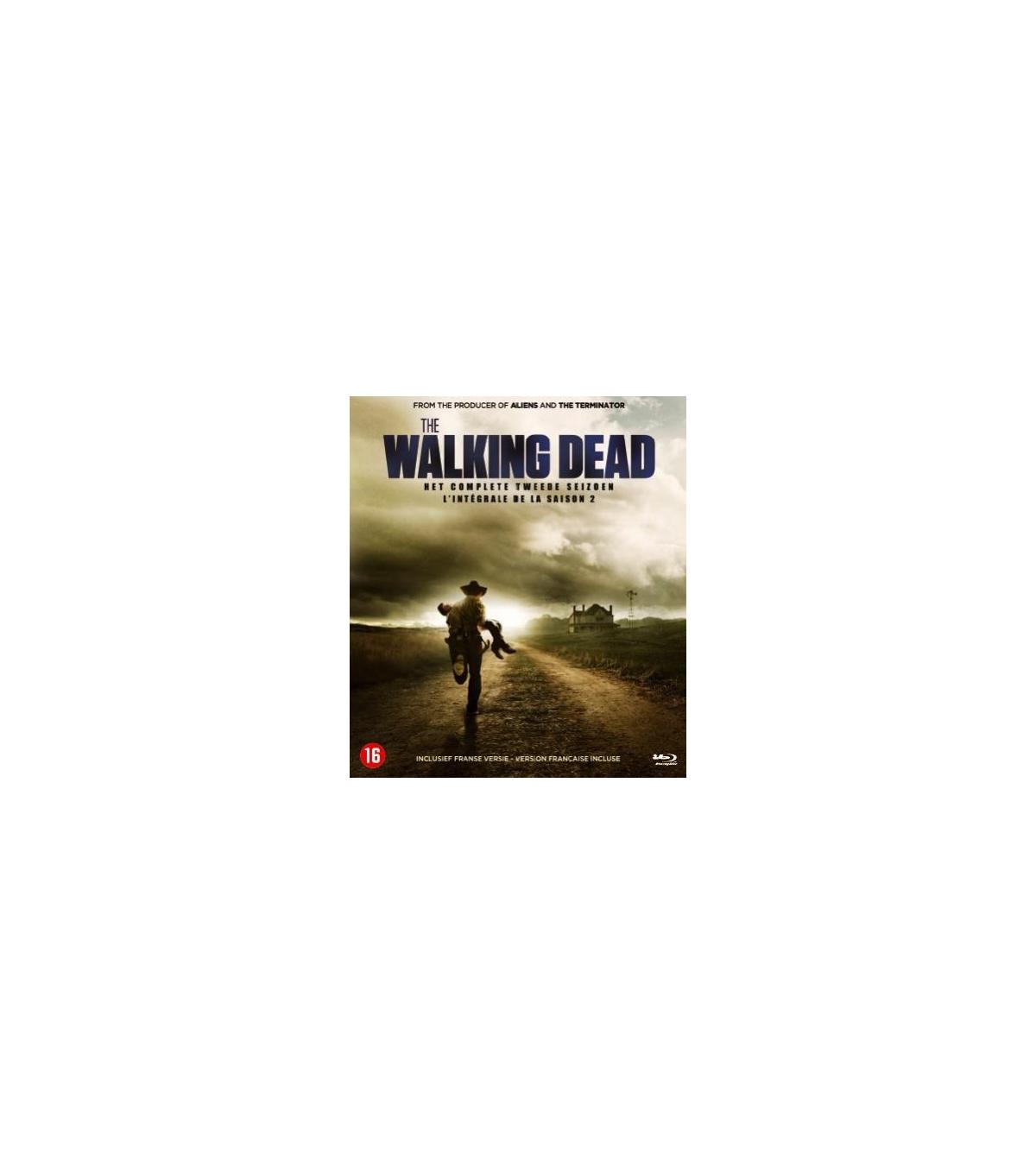 Couverture de DVD pour "The Walking Dead", avec un homme à vélo sur un chemin de terre. Une maison en arrière-plan.