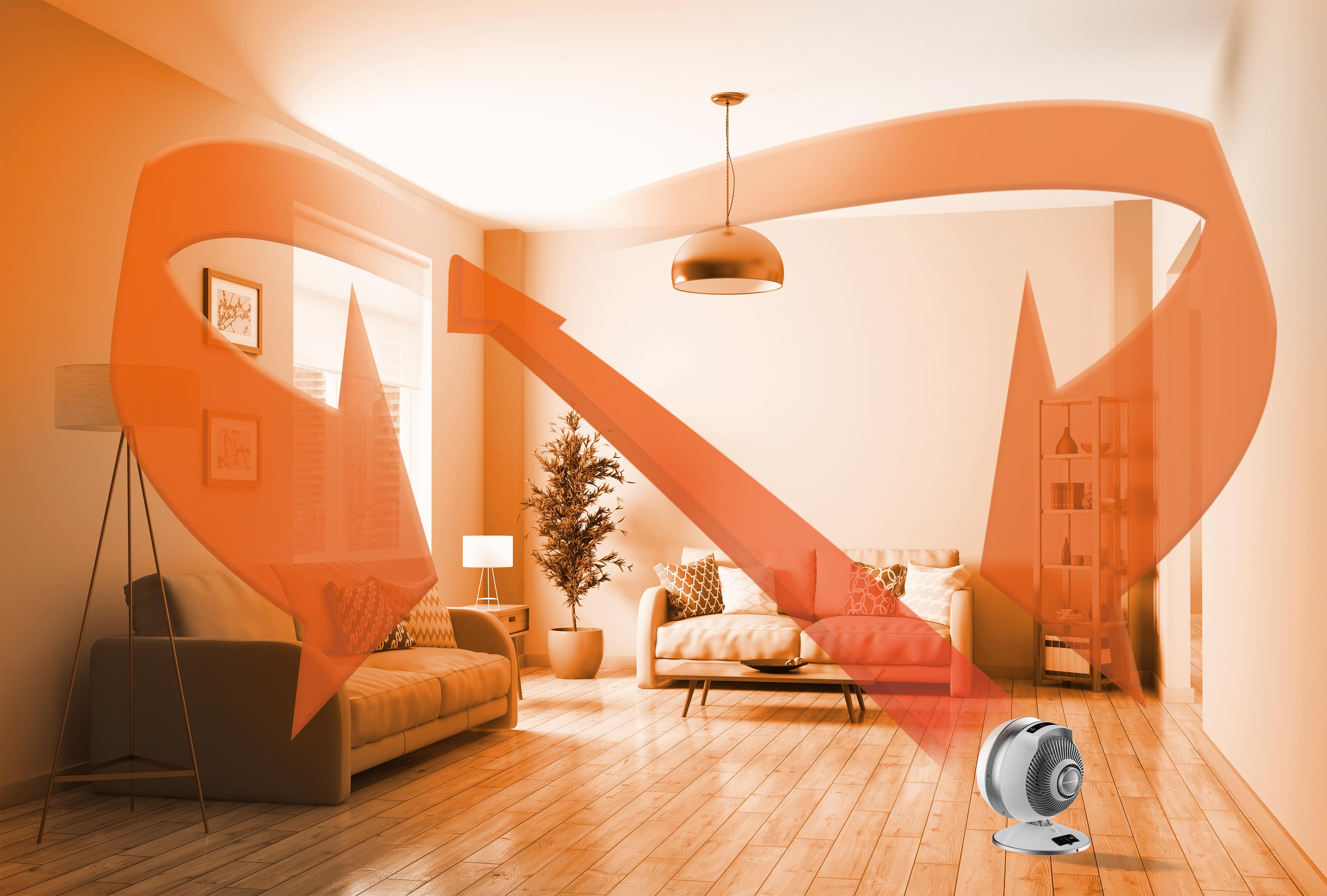 Un interno con un ventilatore, divani e un grafico del flusso d'aria arancione.