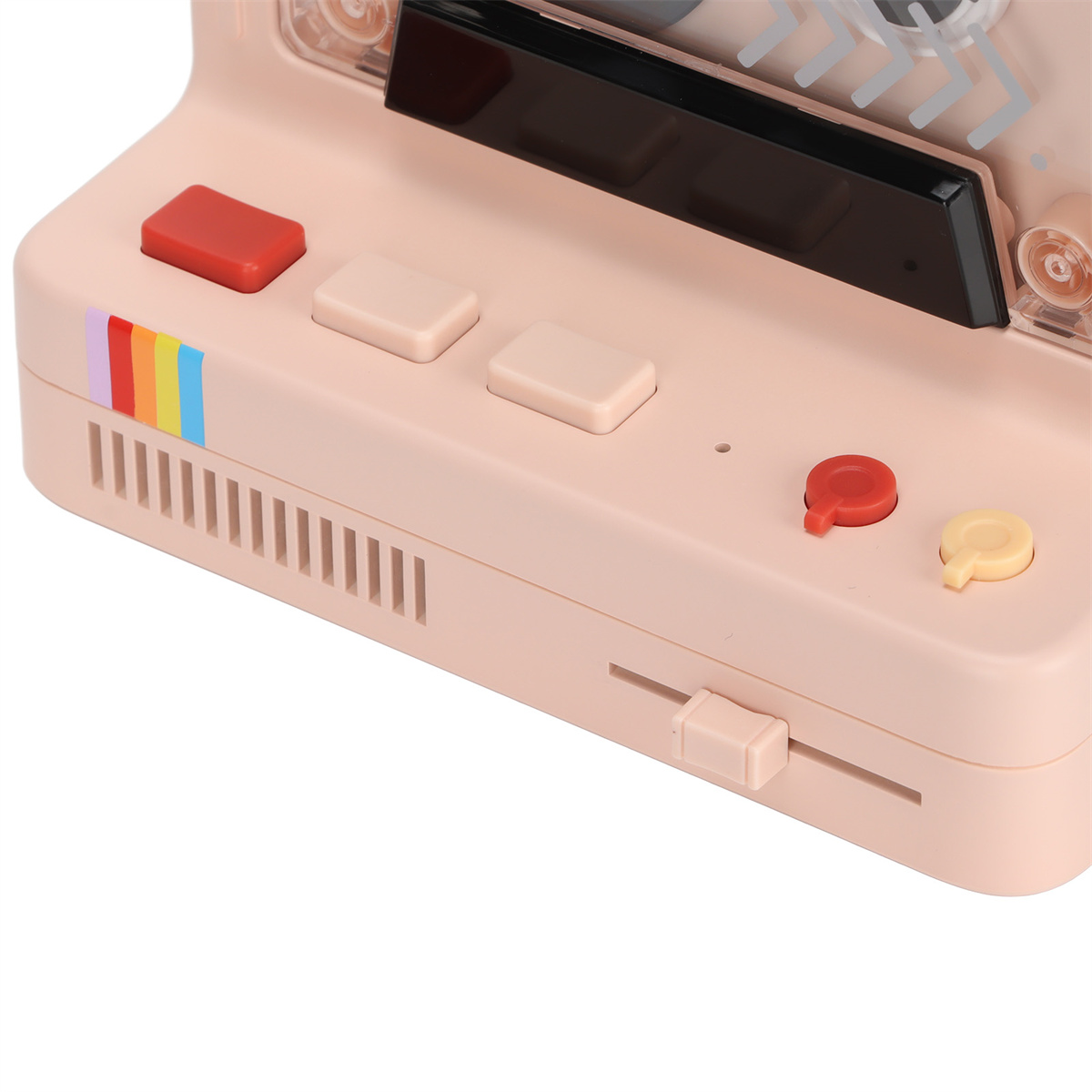 Rosa Retro-Spielkonsole mit Knöpfen, Regenbogenstreifen und einem kleinen Schieberegler.