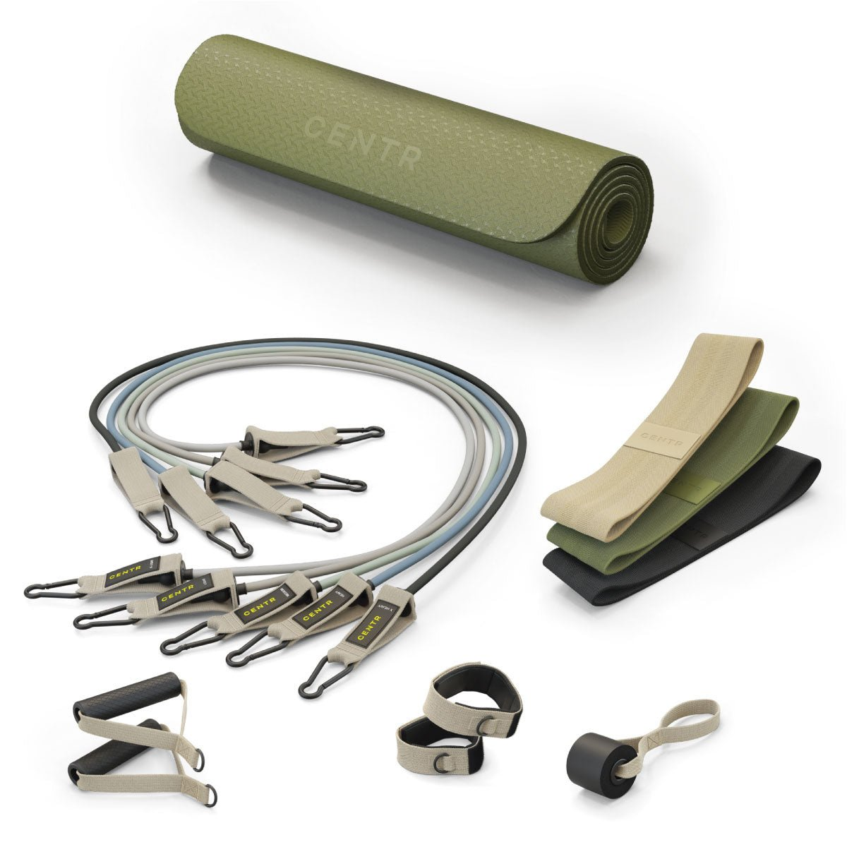 A yoga mat, resistance bands, and other fitness accessories on a white surface.