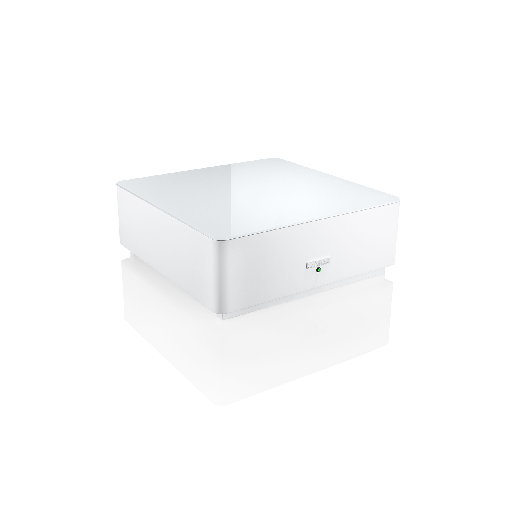 Eine weiße quadratische Box mit glänzender Oberseite und grünem Licht vorne.
