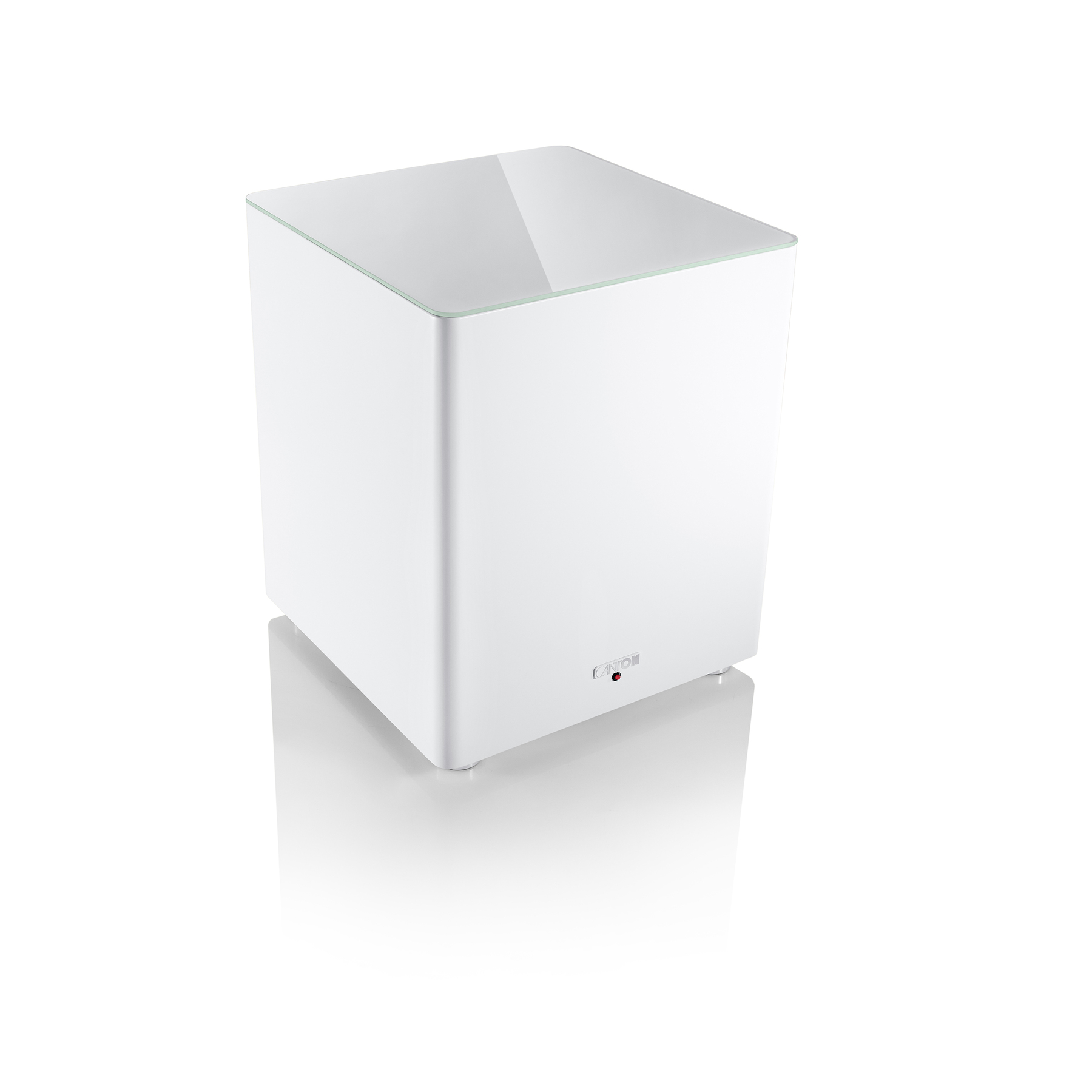 Weißer Subwoofer mit Glasplatte, rotem Kontrolllicht, auf weißer Oberfläche.