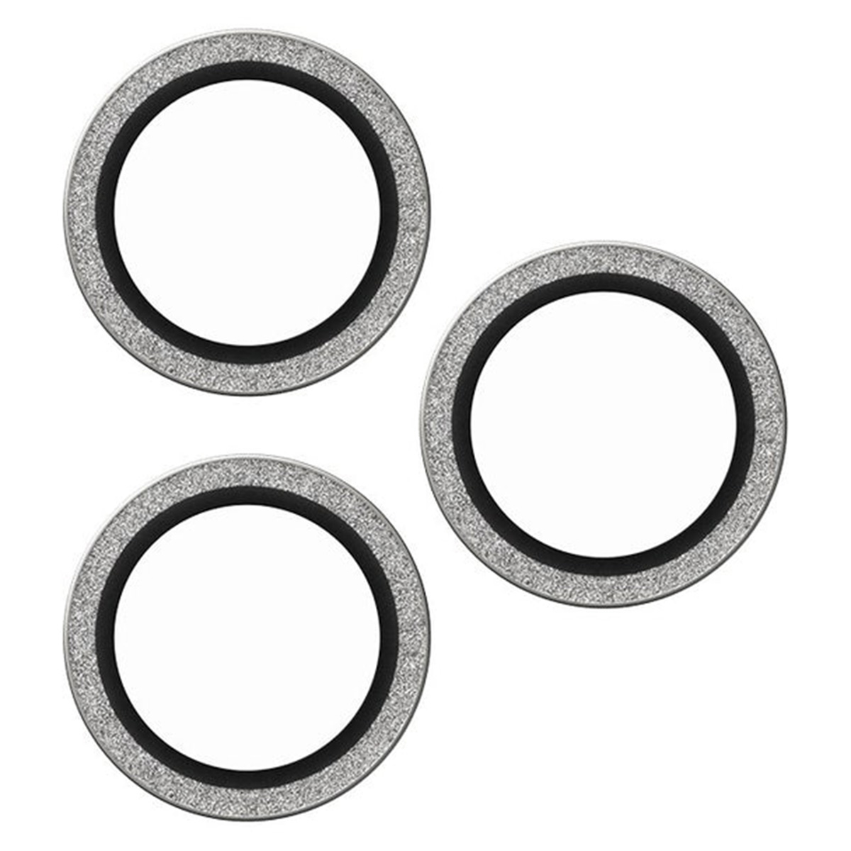 Trzy okrągłe osłony obiektywu aparatu z czarną obwódką i srebrnym, błyszczącym środkiem.