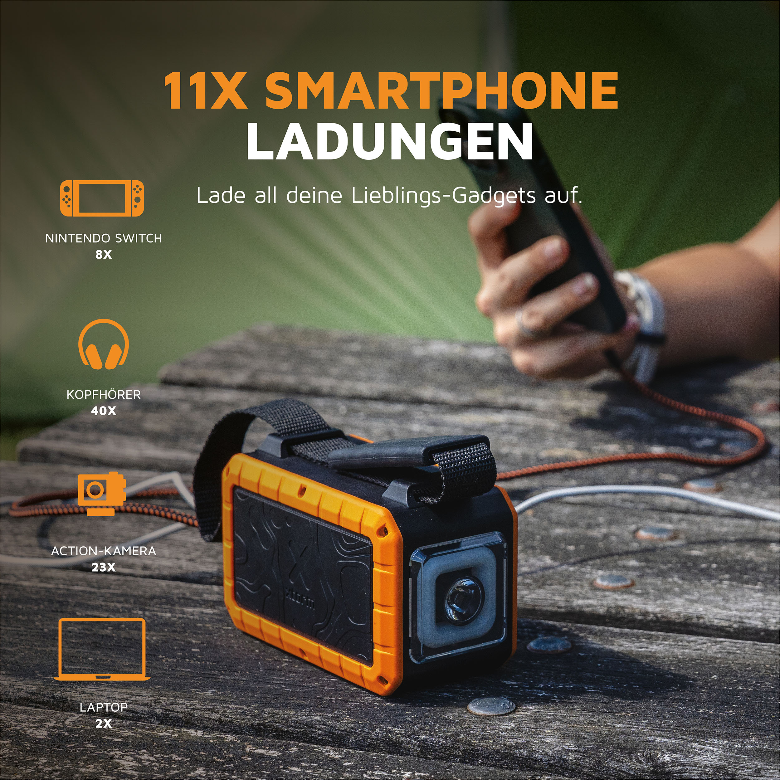 Chargeur portable avec des icônes de smartphone, écouteurs, appareil photo et ordinateur portable. Texte: 11X Chargements de smartphone.