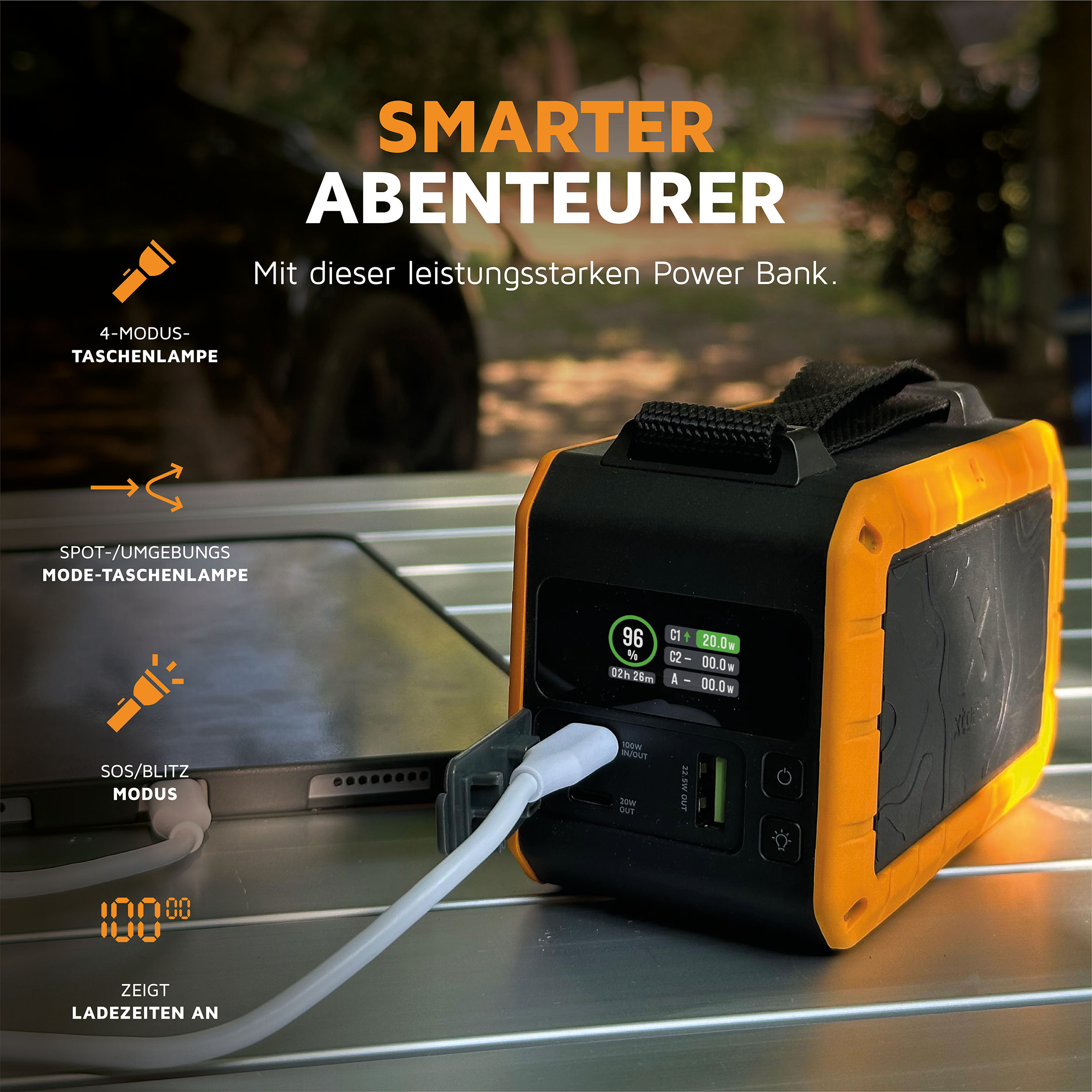 Une batterie externe jaune et noire avec texte et icônes. Montre un câble de chargement et un écran de données.