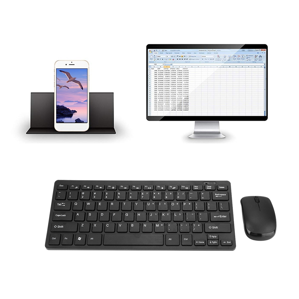 Schreibtisch-Setup mit Telefon, Monitor mit Tabellenkalkulation und schwarzer Tastatur und Maus.