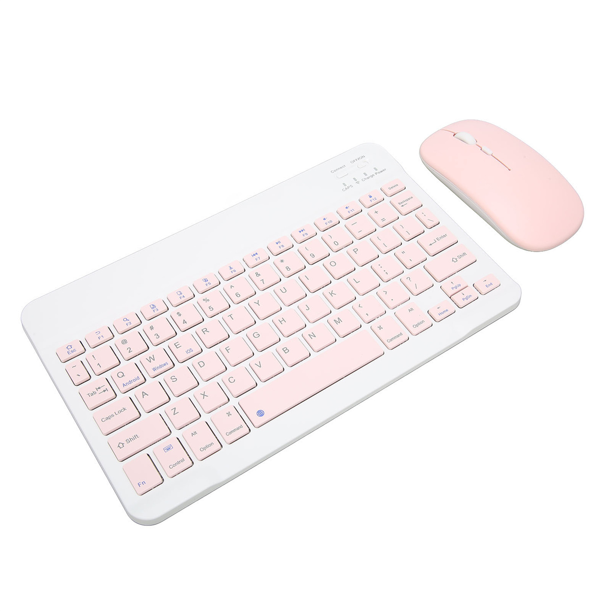 Eine weiße Tastatur und eine rosa Maus liegen auf einer weißen Oberfläche, von oben schräg gestellt.