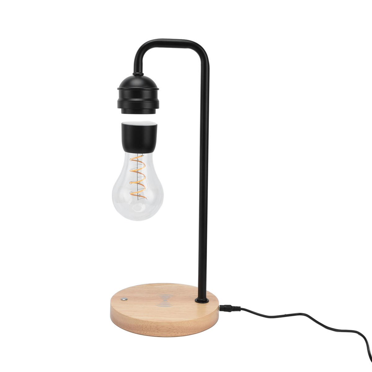 Schwebende Glühbirnenlampe mit Holzsockel und schwarzem Rahmen.