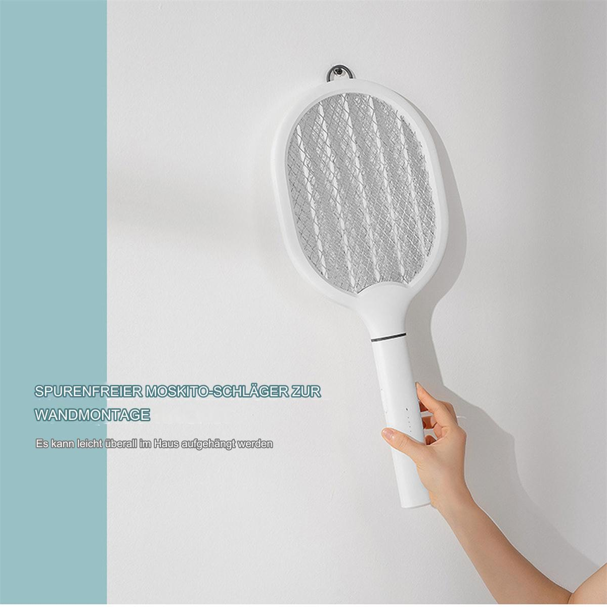 Weißer elektrischer Fliegenklatscher, der an der Wand hängt. Text sagt: SPURENFREIER MOSKITO-SCHLÄGER ZUR WANDMONTAGE.