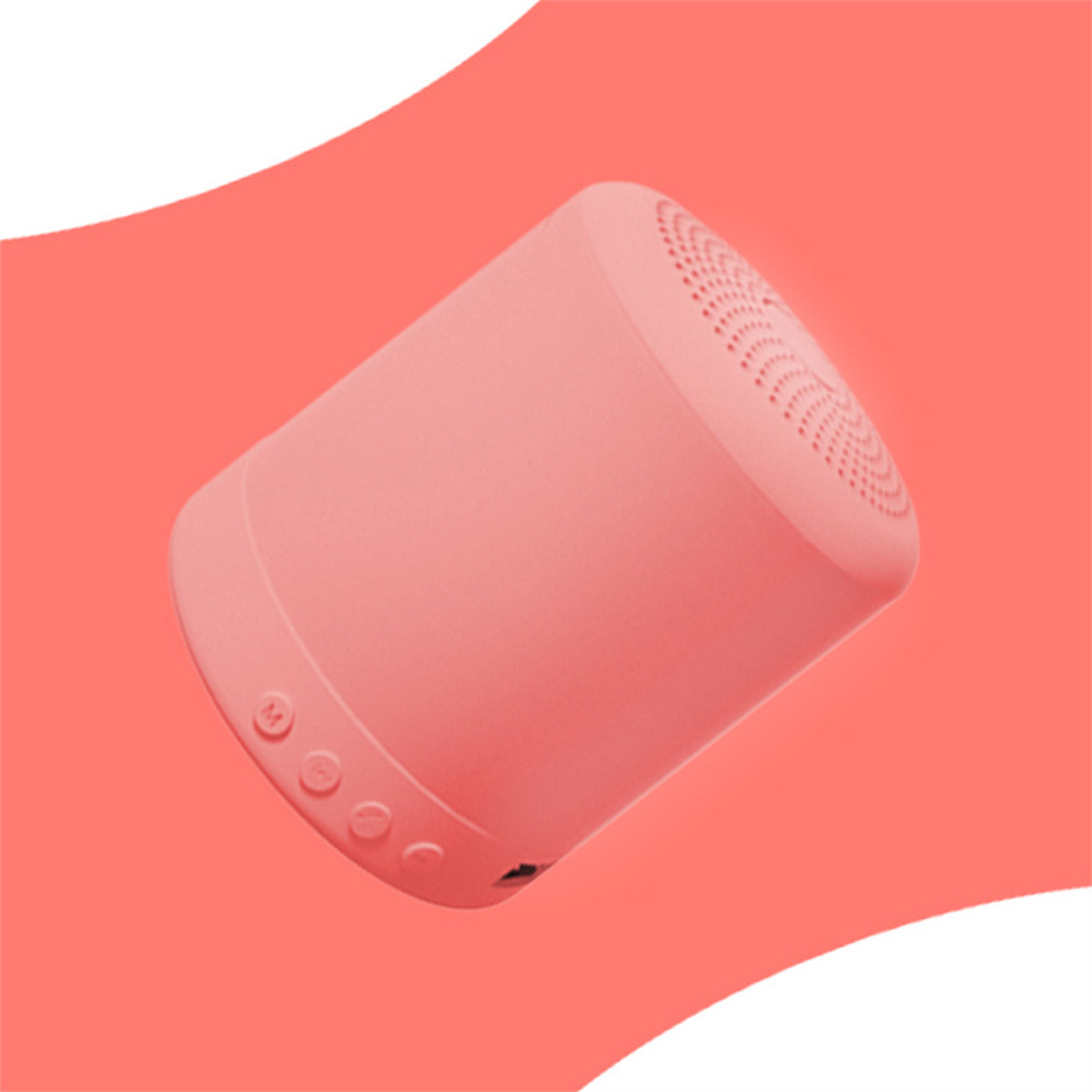 Ein kleiner rosa Lautsprecher. Er hat Knöpfe an der Seite und Löcher oben für den Ton.