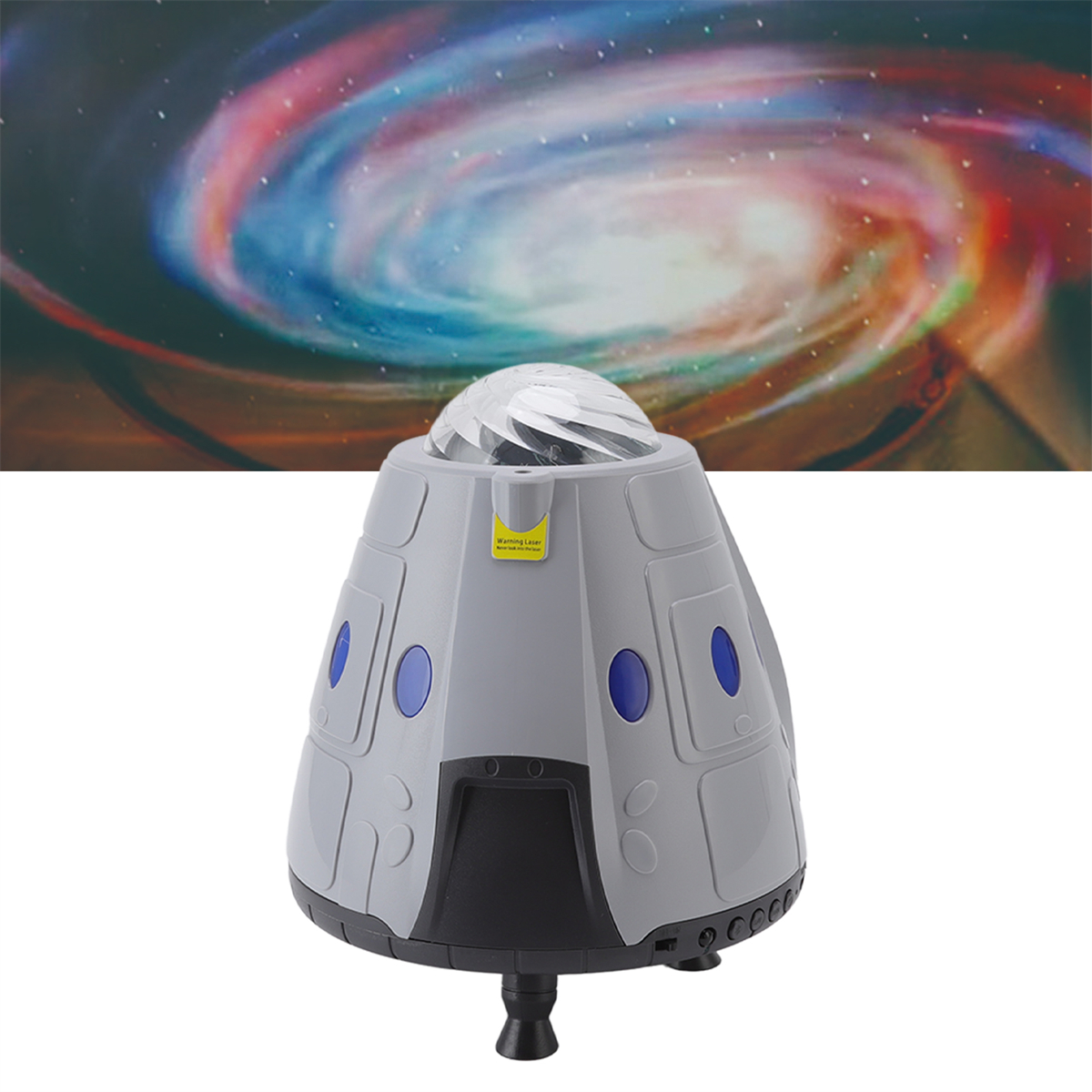 Ein grau-blauer raumschiffartiger Lichtprojektor mit Galaxiehintergrund, der eine himmlische Szene erzeugt.