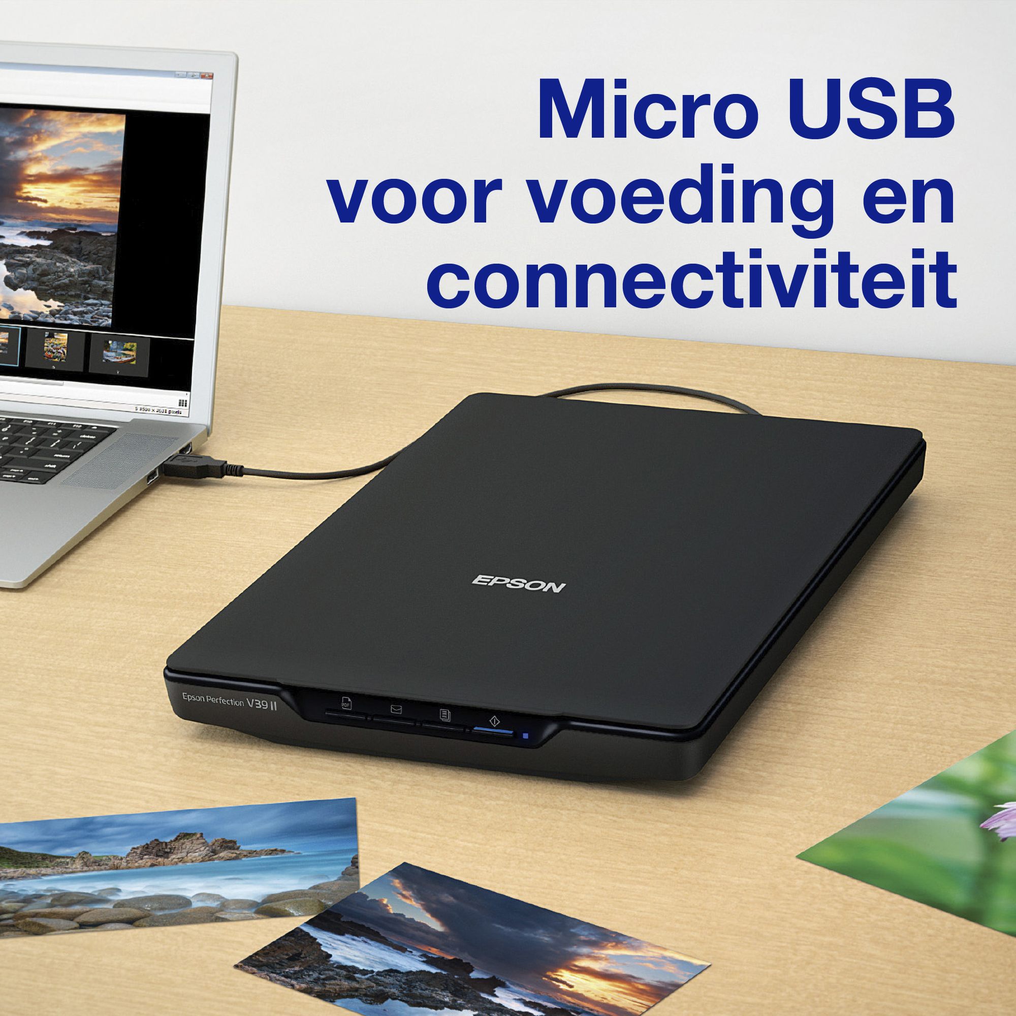 Czarny skaner podłączony do laptopa przez USB. Na biurku są zdjęcia.