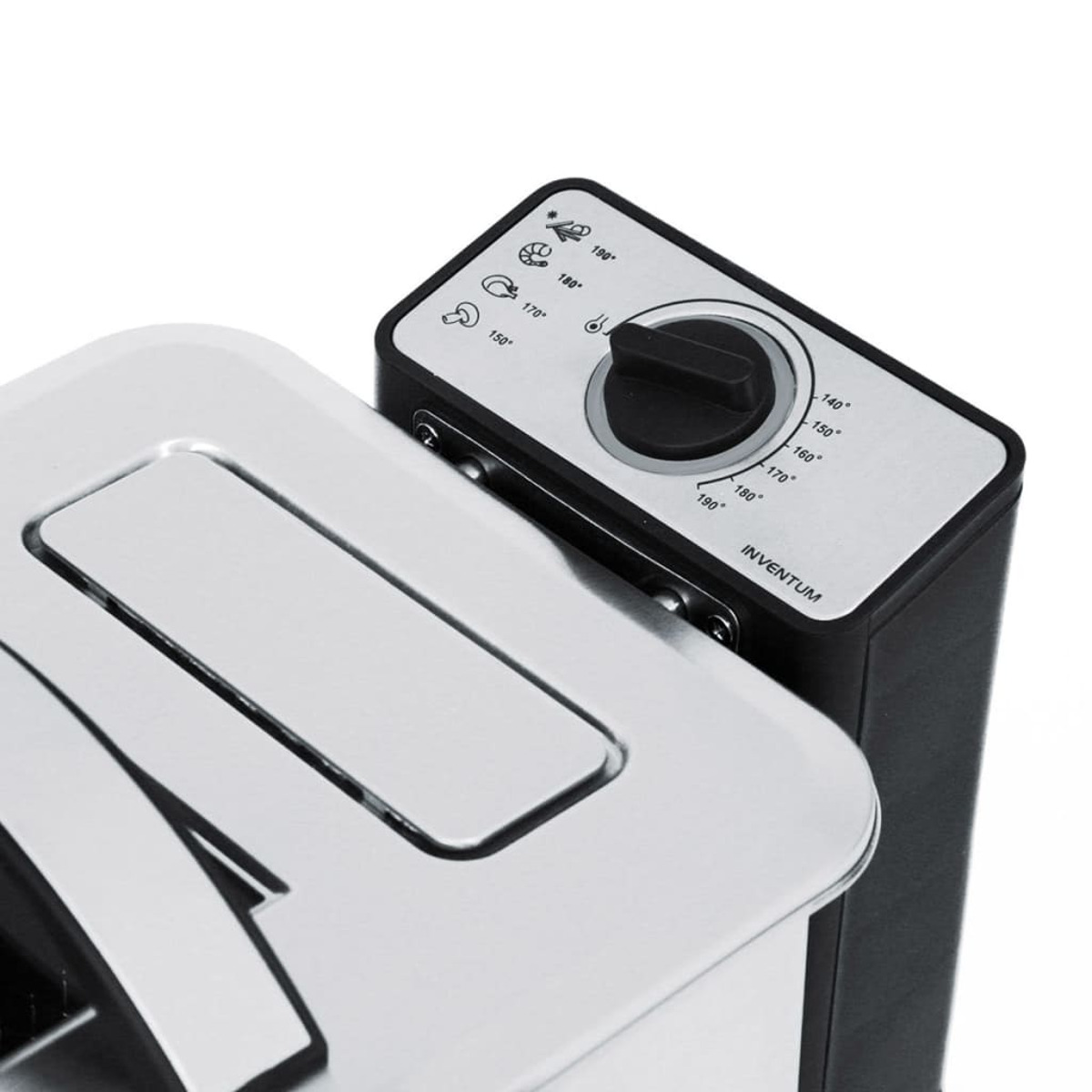 Black and silver appliance with temperature control dial. White background.