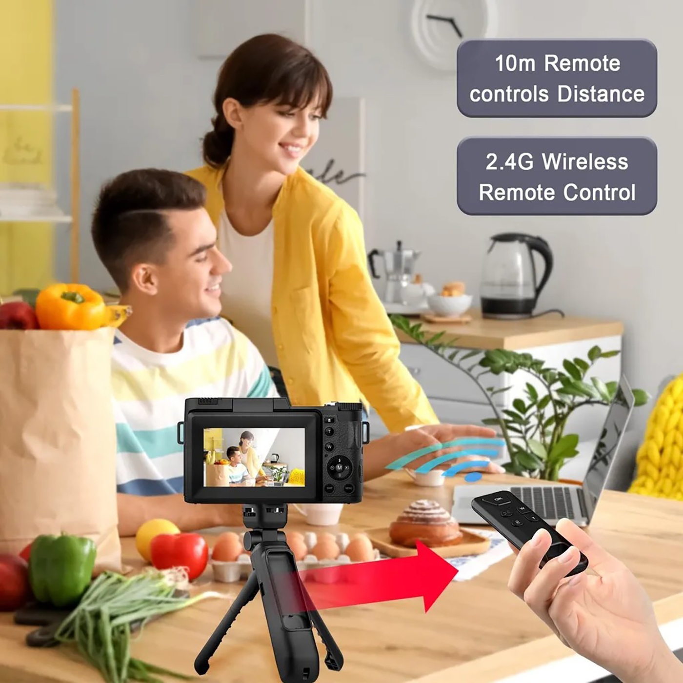 Leute machen Foto mit Kamera auf Stativ, mit Fernbedienung. Küchenhintergrund mit Essen.
