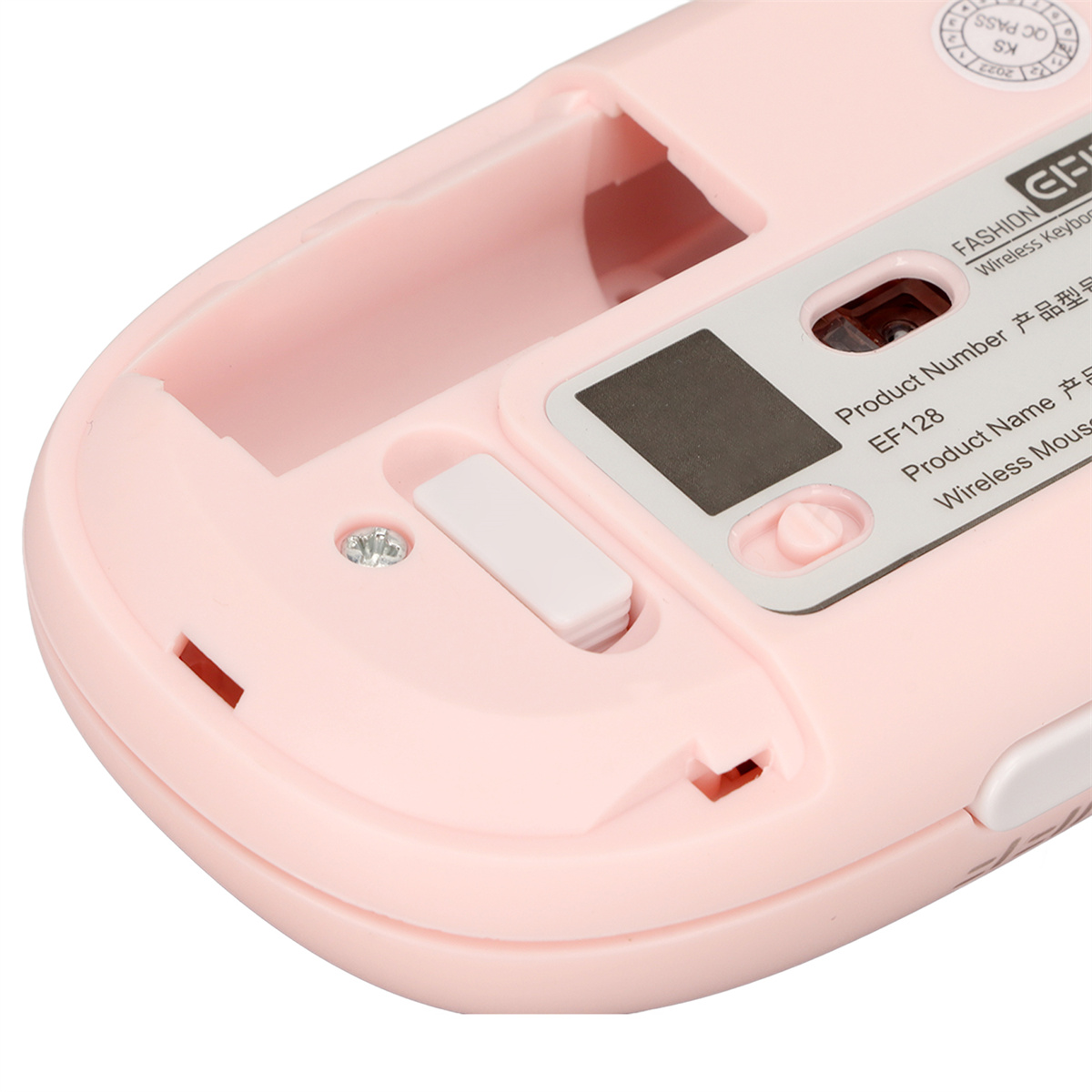 Rosa Computermaus-Unterseite mit leerem Batteriefach und Produktinfo.