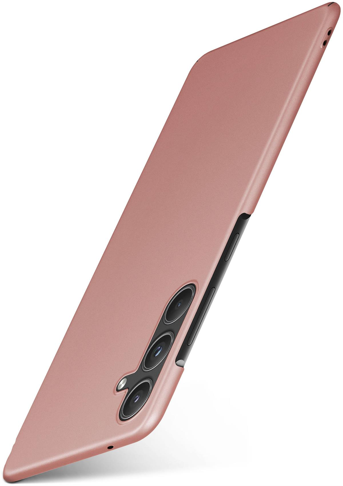 Rosa Telefon, schräge Ansicht, Rückseite mit Kameralinsen und schwarzer Seite.