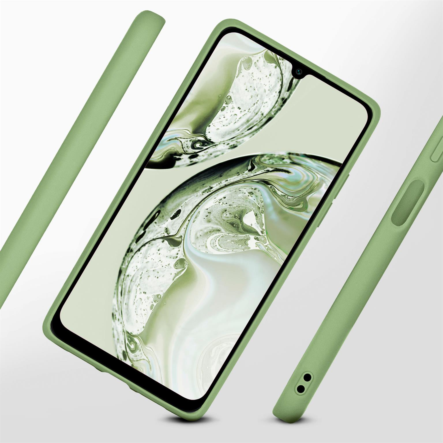 Eine grüne Handyhülle mit Display. Das Telefon befindet sich in einer Hülle. Verschiedene Teile der Hülle sind sichtbar.