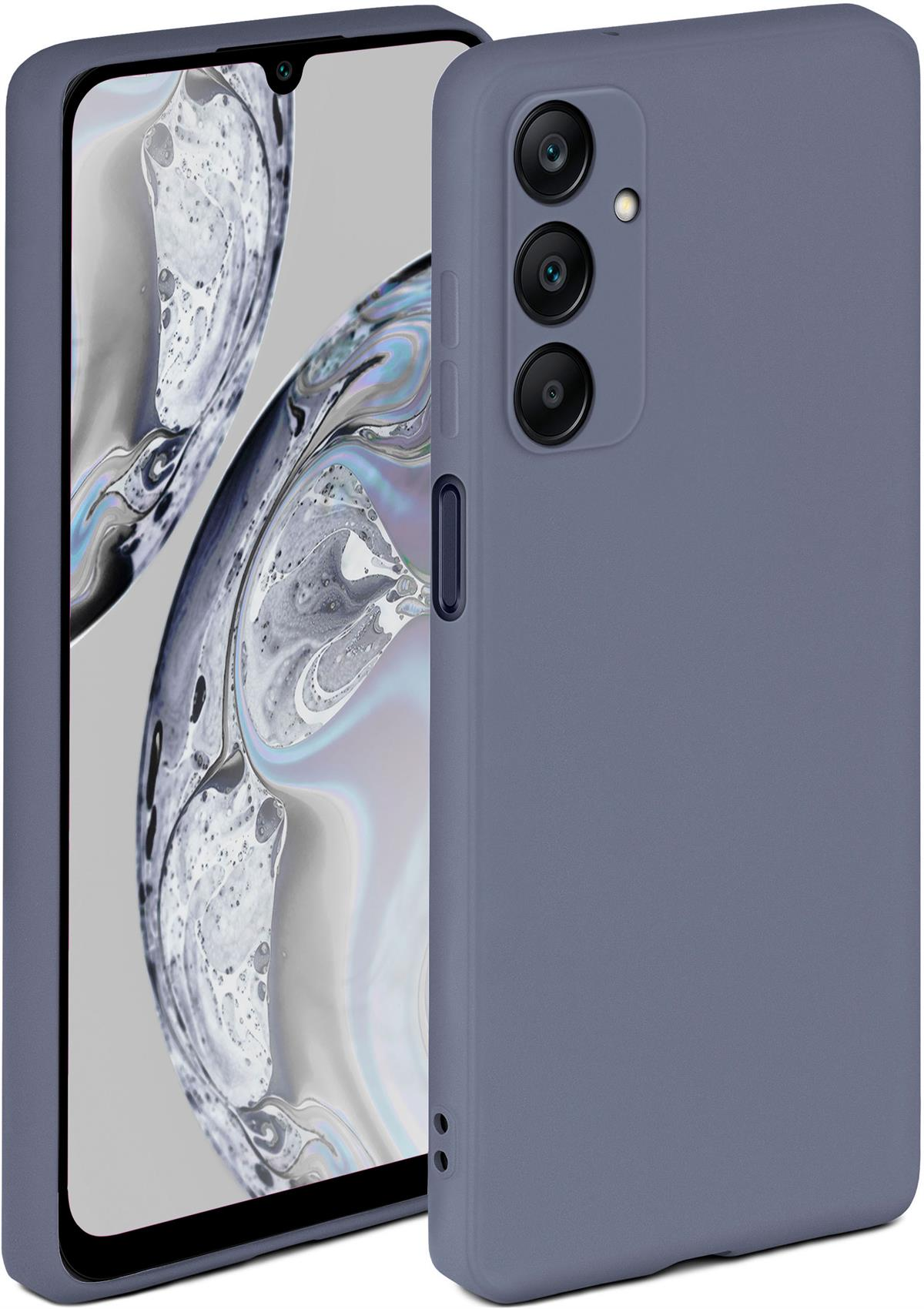 Eine blau-graue Handyhülle mit einem Handy darin. Der Hintergrund ist ein abstraktes Design.