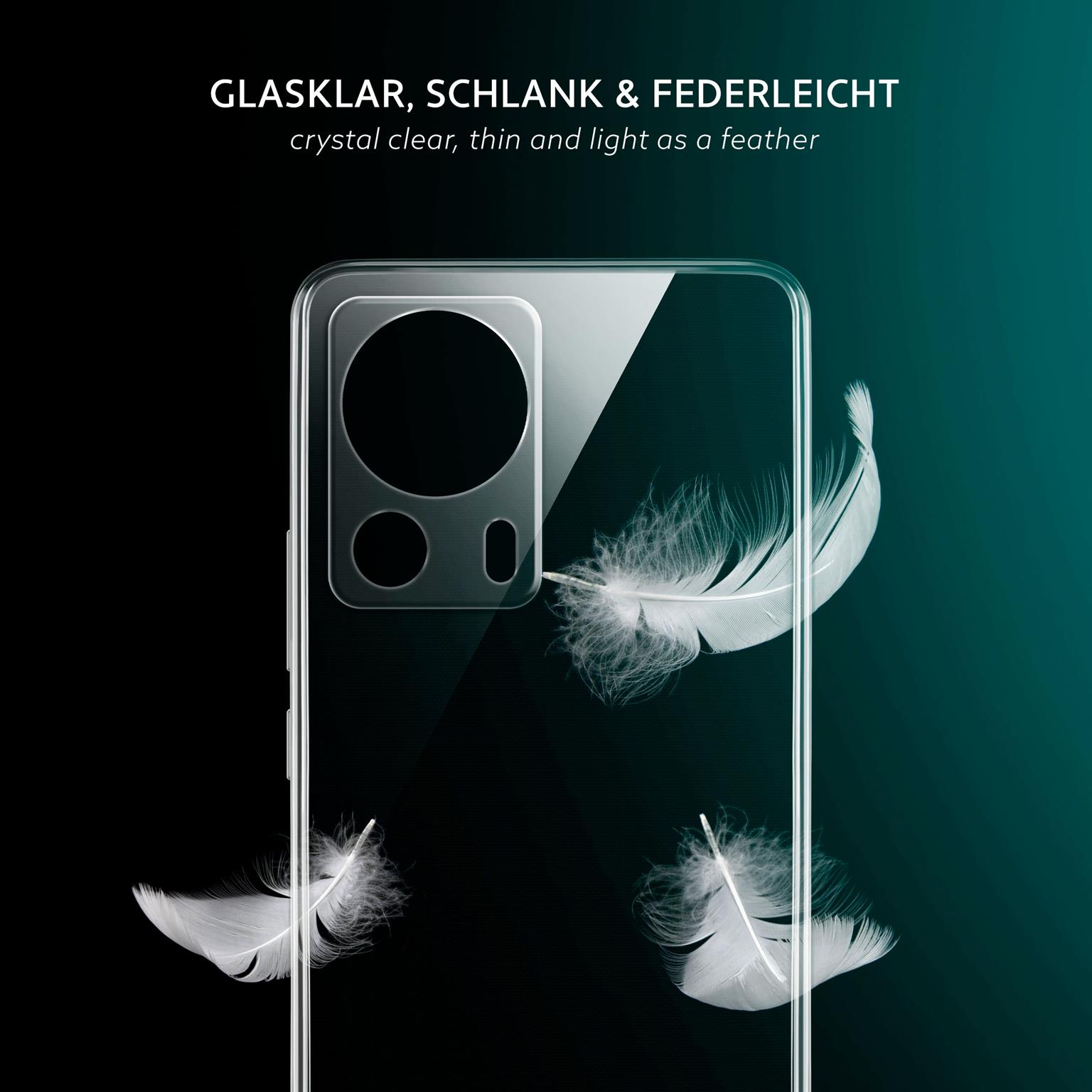Eine transparente Handyhülle mit Federn, die darin schweben. Der Hintergrund ist dunkel mit einem Gradienteneffekt.