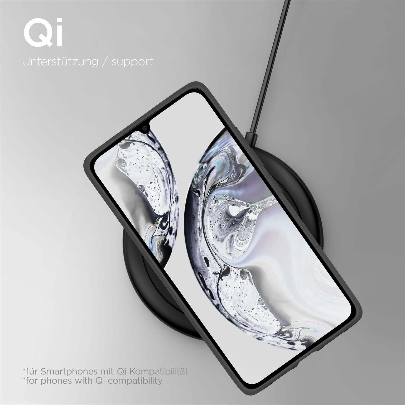 Ein Telefon auf einem Ladepad. Das Telefon befindet sich in einer schwarzen Hülle.