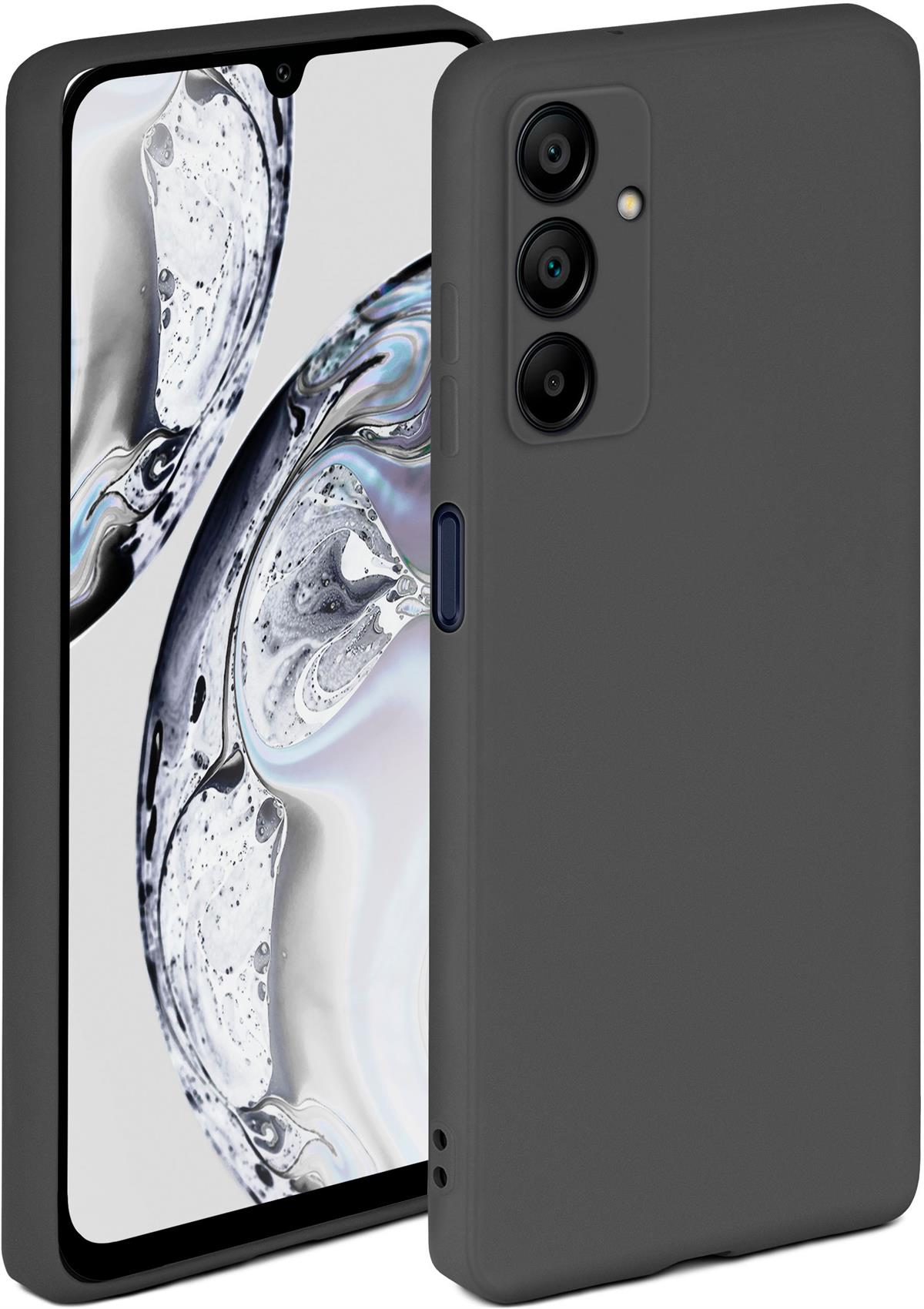 Graues Telefon und Hülle. Telefon hat Kameras. Hintergrund ist ein verschwommenes Muster.