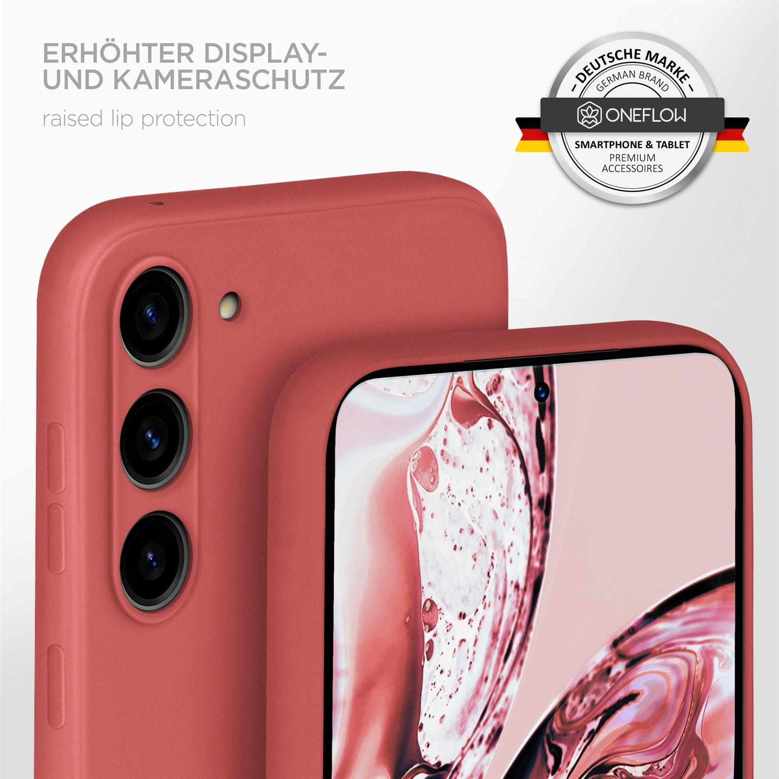 Eine korallenfarbene Handyhülle mit erhöhtem Kameraschutz. Ein Telefon ist darin.
