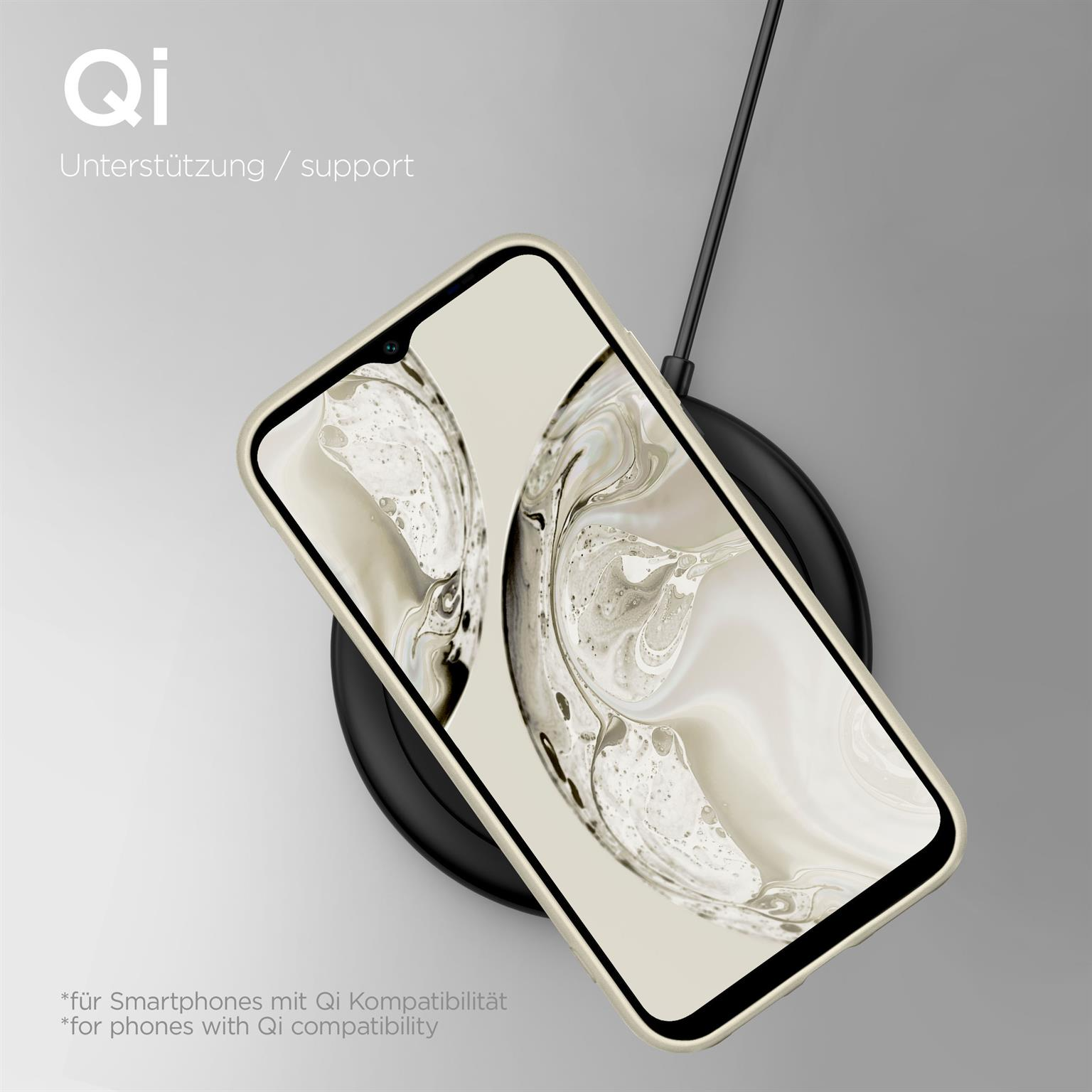 Ein Telefon auf einem kabellosen Ladegerät, mit weißem und beigem Design, und einem schwarzen Ladepad.