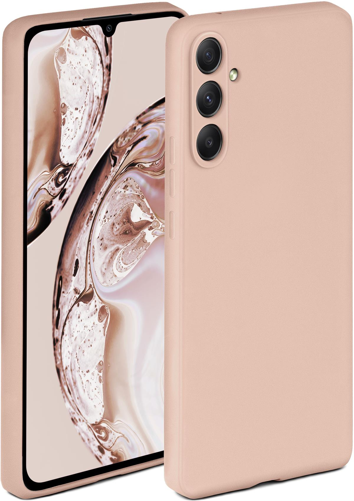 Rosa Handyhülle. Telefon wird im Inneren angezeigt. Drei Kameras auf der Rückseite.