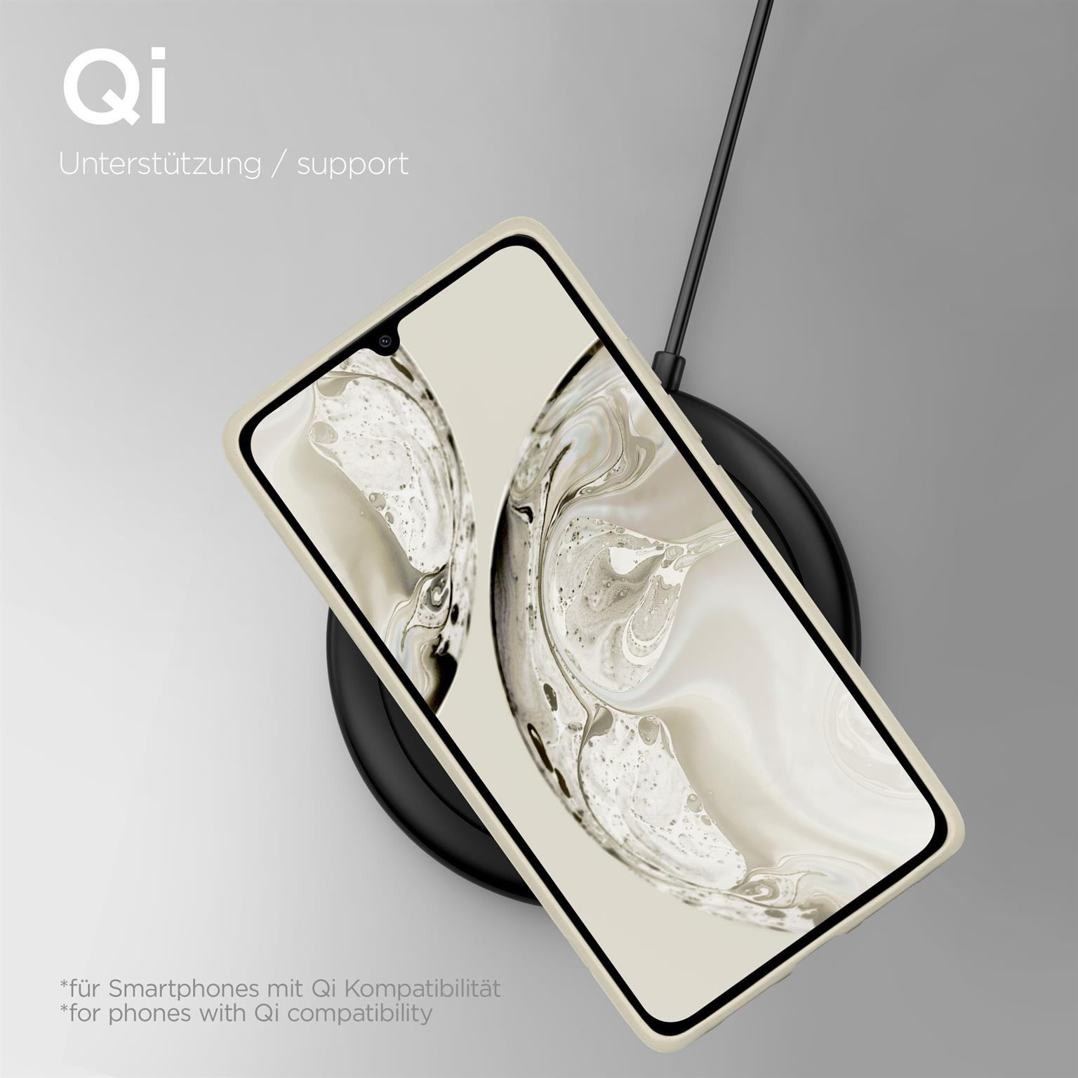 Telefon auf kabellosem Ladegerät mit Qi-Unterstützung. Das Telefon ist in einer Hülle. Das Ladegerät ist schwarz.