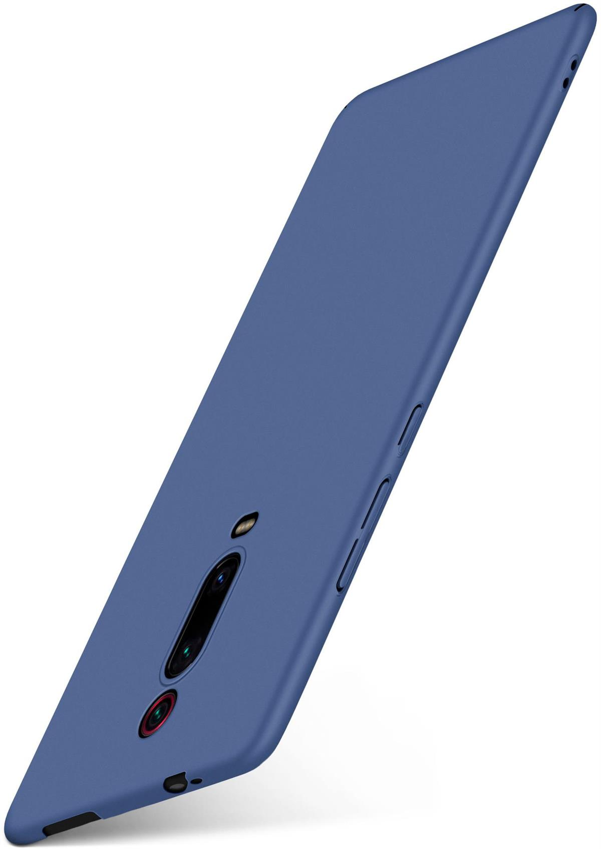 Blaues Telefon schräg, Rückseite zeigend. Kamera und Blitz oben. Knöpfe an der Seite.
