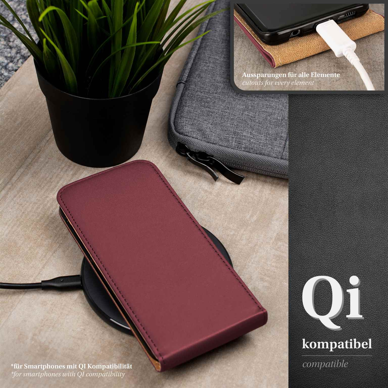 Smartphone auf einem Qi-Ladegerät, mit roter Hülle. Ein schwarzer Topf und eine graue Hülle sind sichtbar.