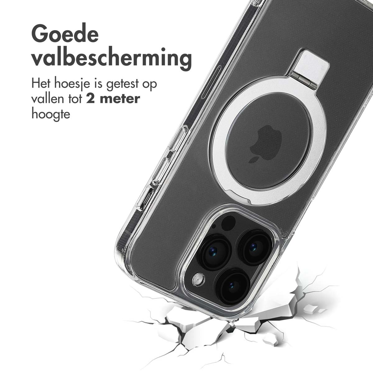 Un telefono con una custodia trasparente sta cadendo su una superficie incrinata. La custodia ha un anello.