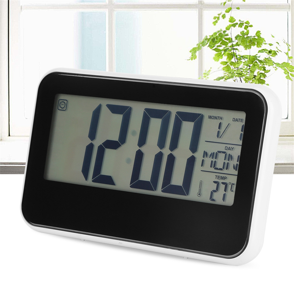 Digitaluhr zeigt 12:00 Uhr an. Es ist Montag, der 1., mit 27°C.