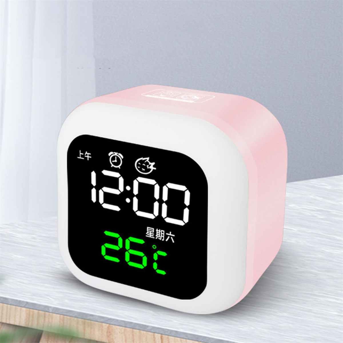 Rosa und weiße Digitaluhr. Zeigt Zeit, Temperatur und Wochentag an.